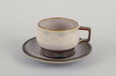 Bing & Grøndahl, "Tema". Four sets of tea cups with saucers in stoneware.