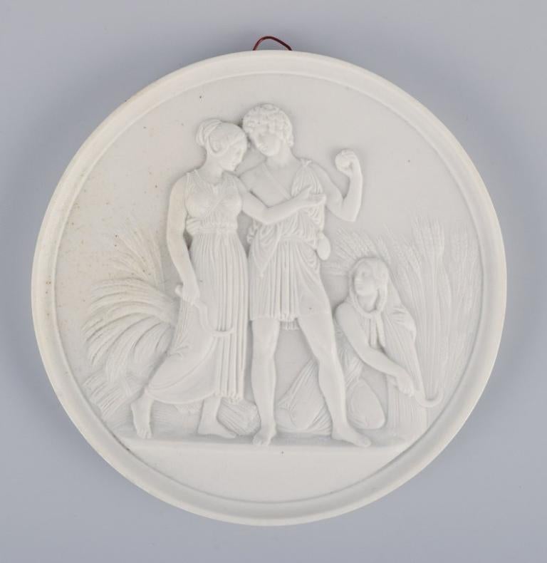 Bing & Grøndahl, three wall plaques in bisquit after Thorvaldsen. 
Motifs in relief. 
1930s. 
In excellent condition.
Marked.
First factory quality.
Dimensions: D 14.5 cm.