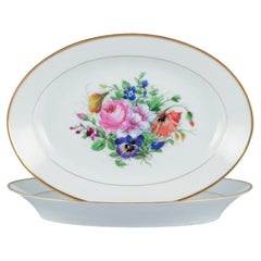 Bing & Grøndahl, two oval platters hand-painted with polychrome flower motifs