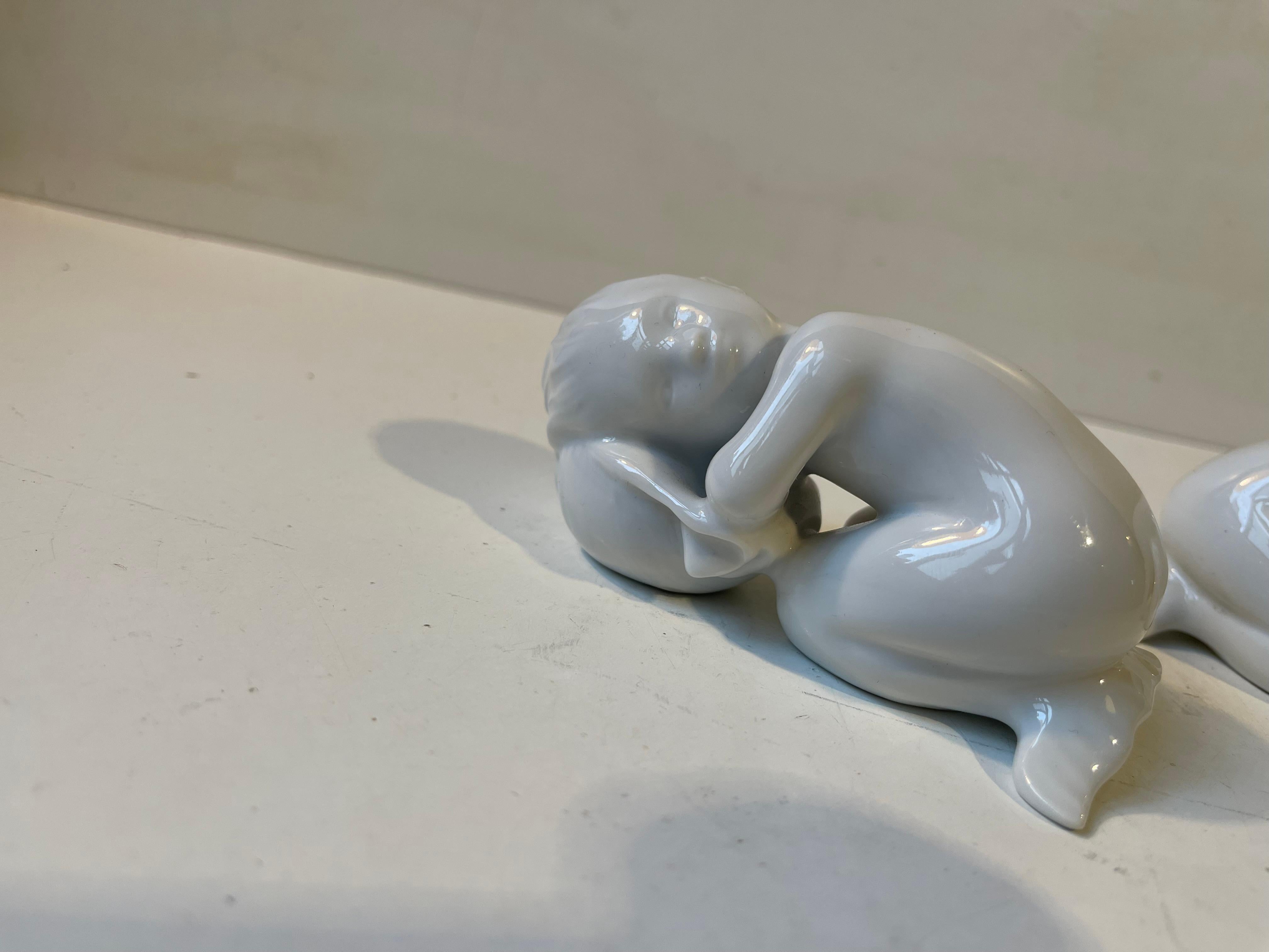 Mid-Century Modern Bing & Grøndahl White Porcelain Figurines - Mermaid Kids, Set of 2 For Sale