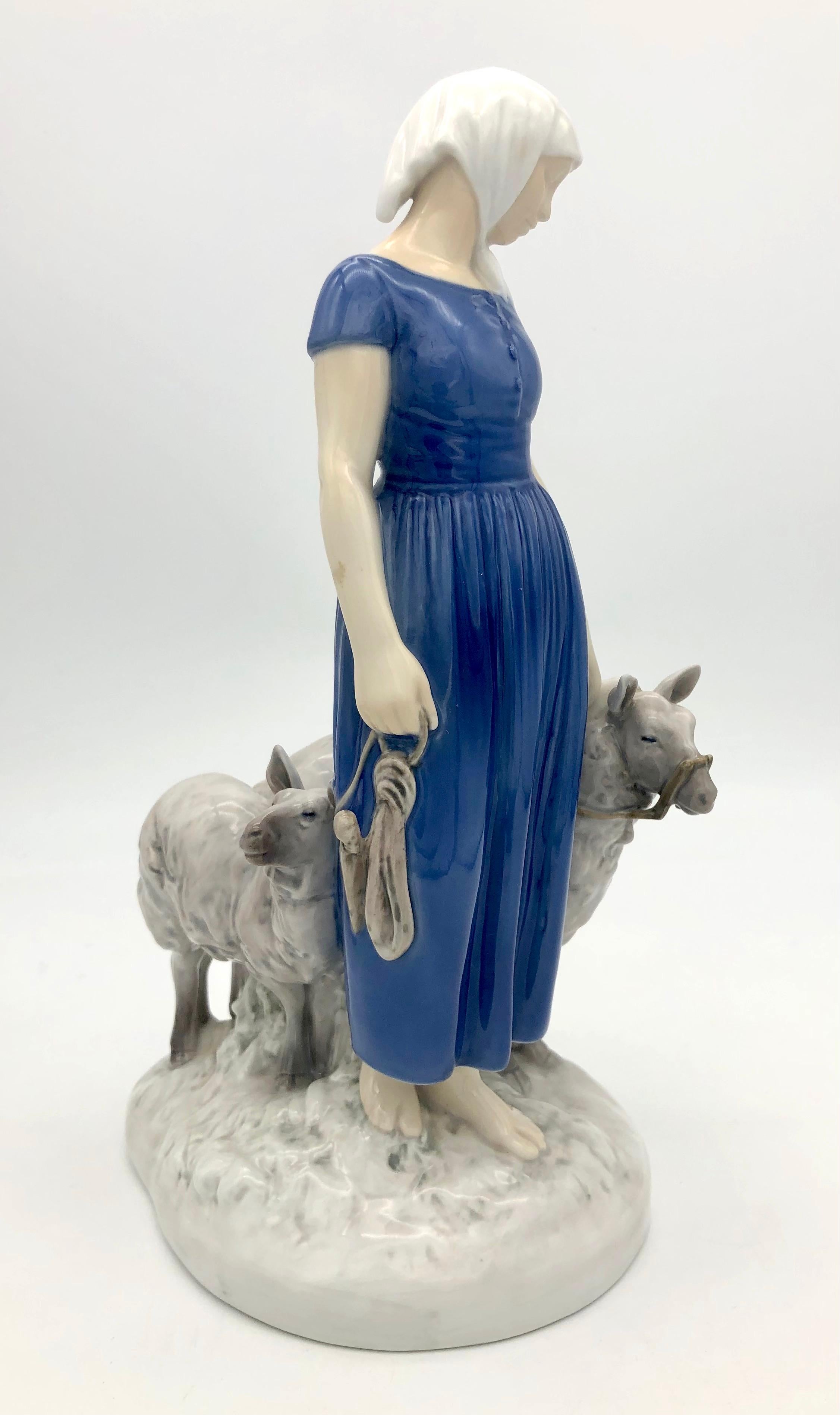 This young sheperdess with her flock has been created by Axel Locker. Locker designed several pastural scenes for Bing & Groendal, for whom he started working at the end of the nineteenth century.