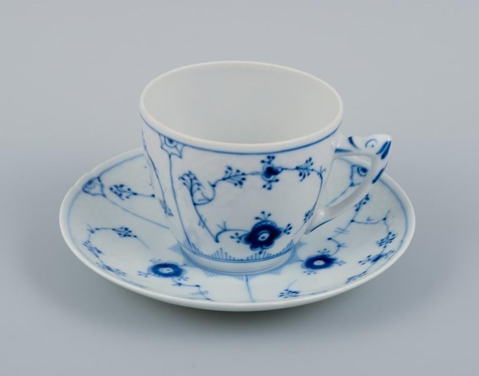 Bing & Grondahl, Denmark, Blue Fluted plain.
Four pairs of coffee cups with saucers.
Mid-20th century.
Model 305.
In perfect condition.
First factory quality.
Marked.
Cup: H 6.3 x D 7.6 cm.