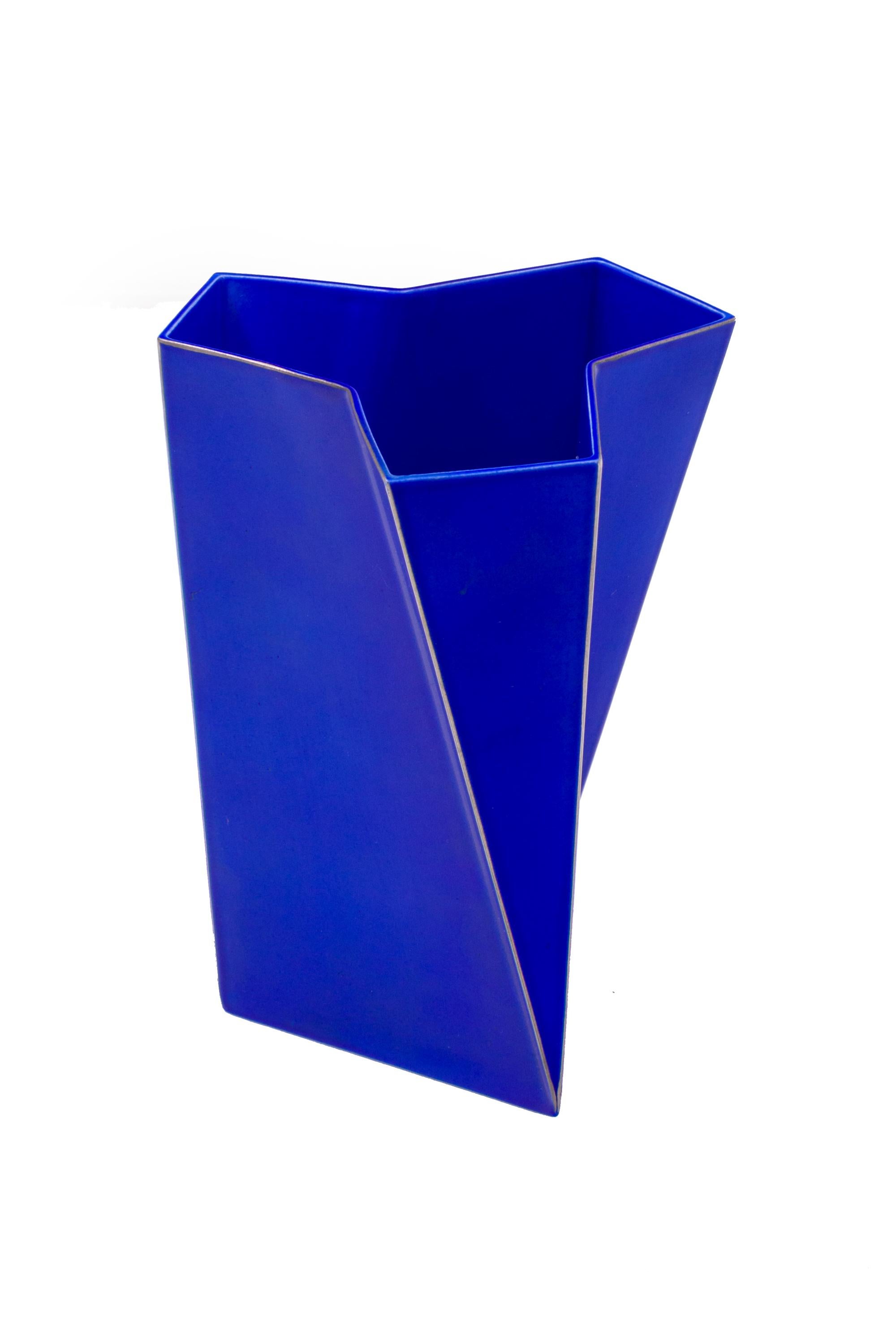 An incredibly striking intense blue vase. A wonderful form reminiscent of the Art Deco period with Post Modernist influences.