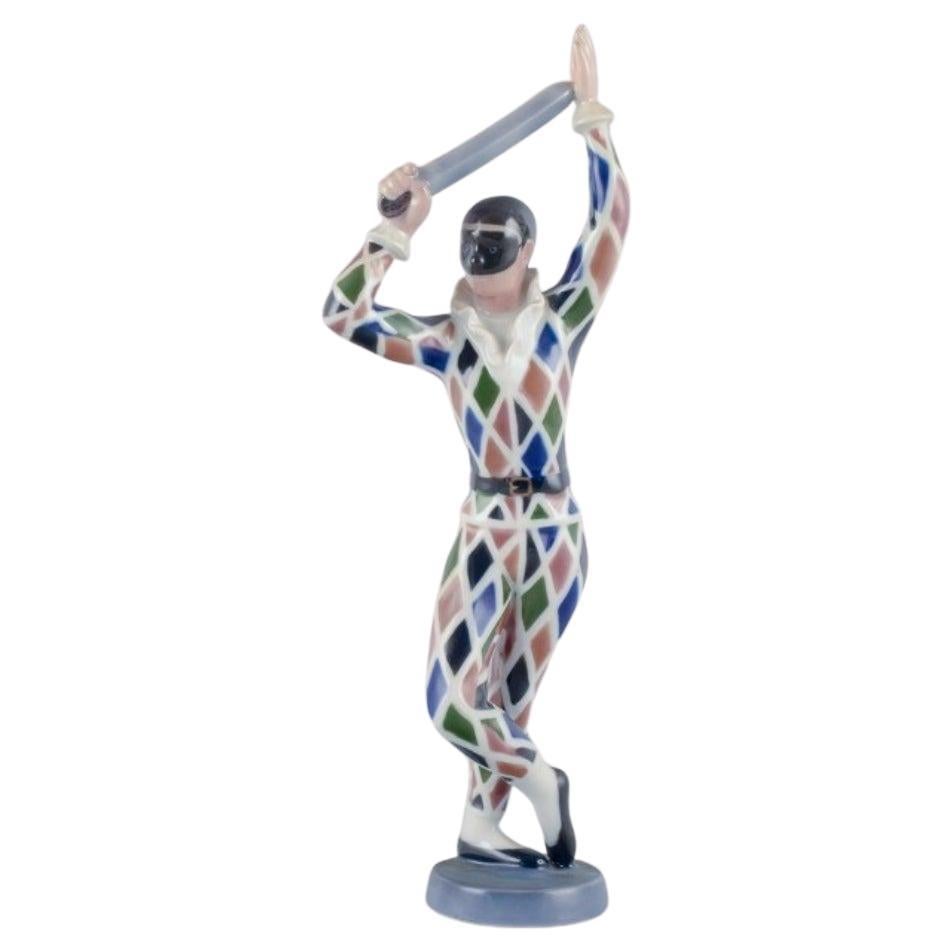 Bing & Grondahl. Porcelain figure of Harlequin. Designed by Ebbe Sadolin. For Sale