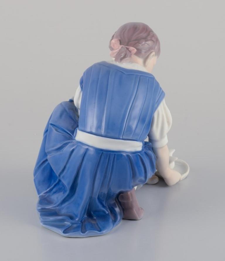 Bing & Grondahl porcelain figurine. Girl with cat.  Mid 20th c. For Sale 1