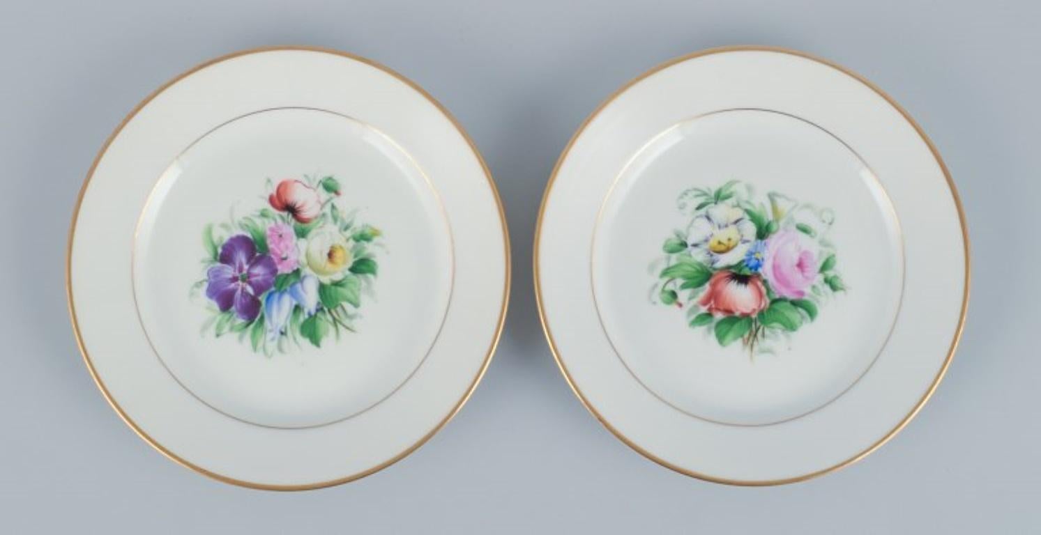 Danish Bing & Grondahl, set of fourteen plates hand-painted with flowers. For Sale