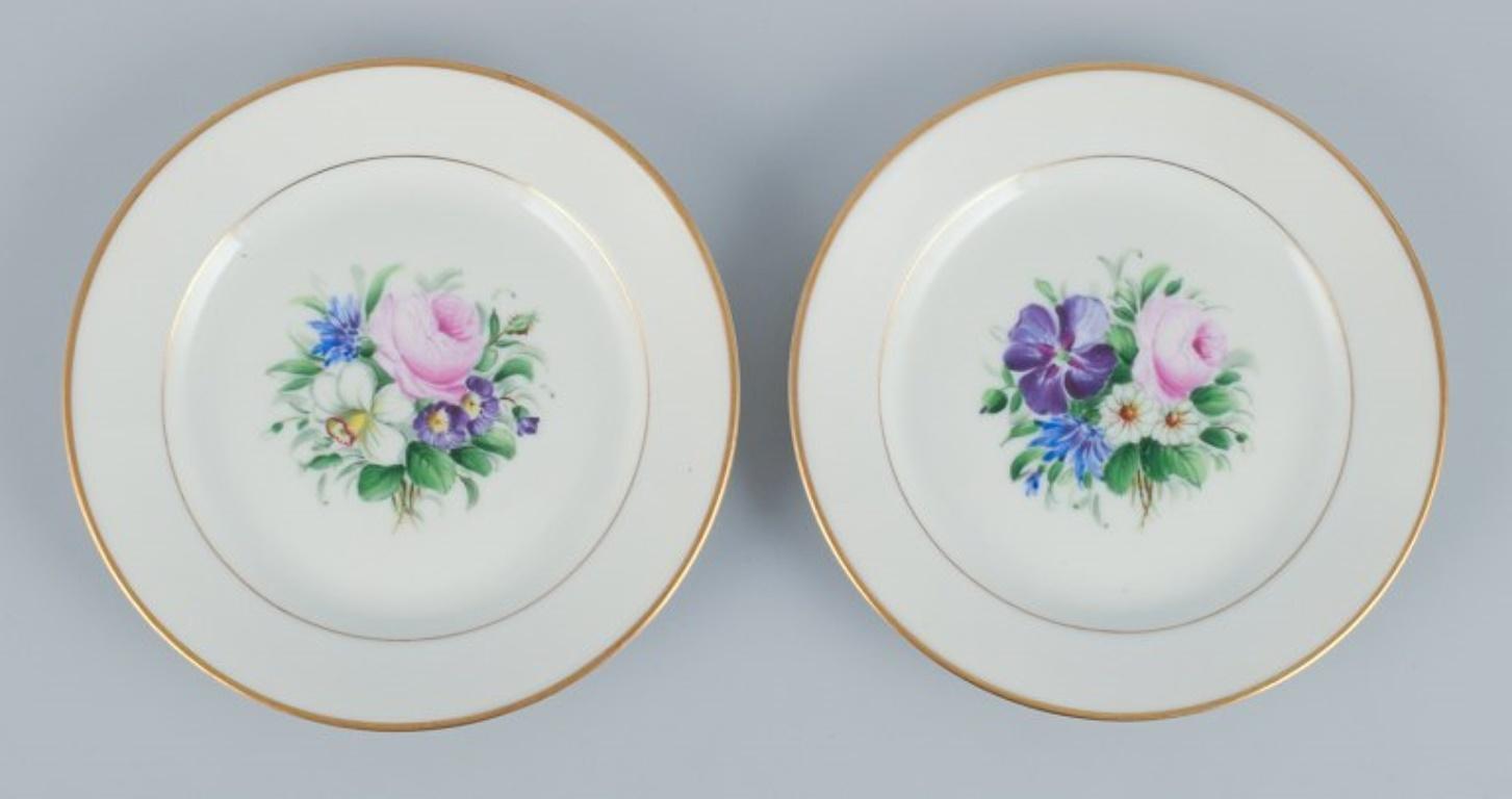Porcelain Bing & Grondahl, set of fourteen plates hand-painted with flowers. For Sale