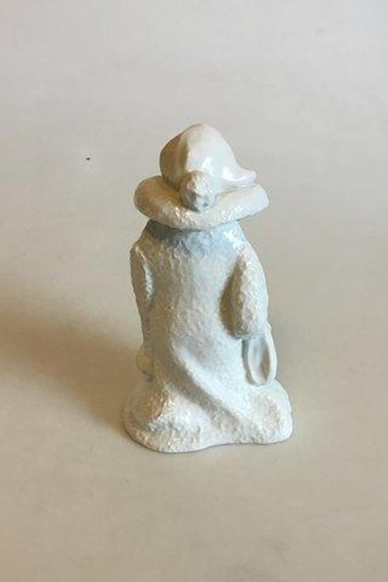 Bing & Grondahl undecorated figurine of girl with bag.

Measures 17 cm / 6 11/16 in.