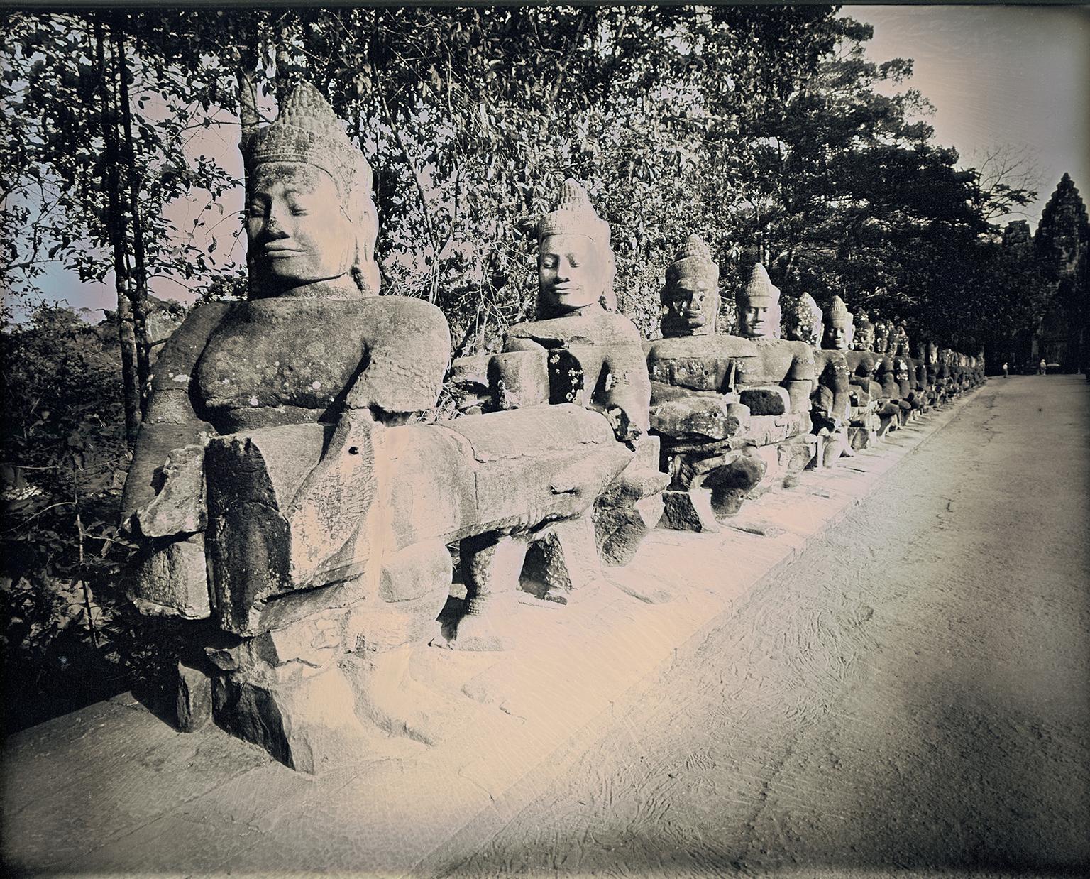 Landscape Photograph Binh Danh - ""Entrance to Angkor Thom" daguerréotype sur statues de bouddhistes en argent