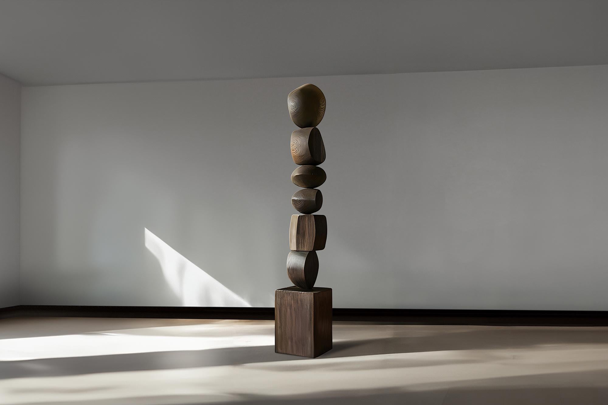Biomorphic Burned Oak Elegance, Still Stand No83, Crafted by NONO
——


Joel Escalona's wooden standing sculptures are objects of raw beauty and serene grace. Each one is a testament to the power of the material, with smooth curves that flow into one