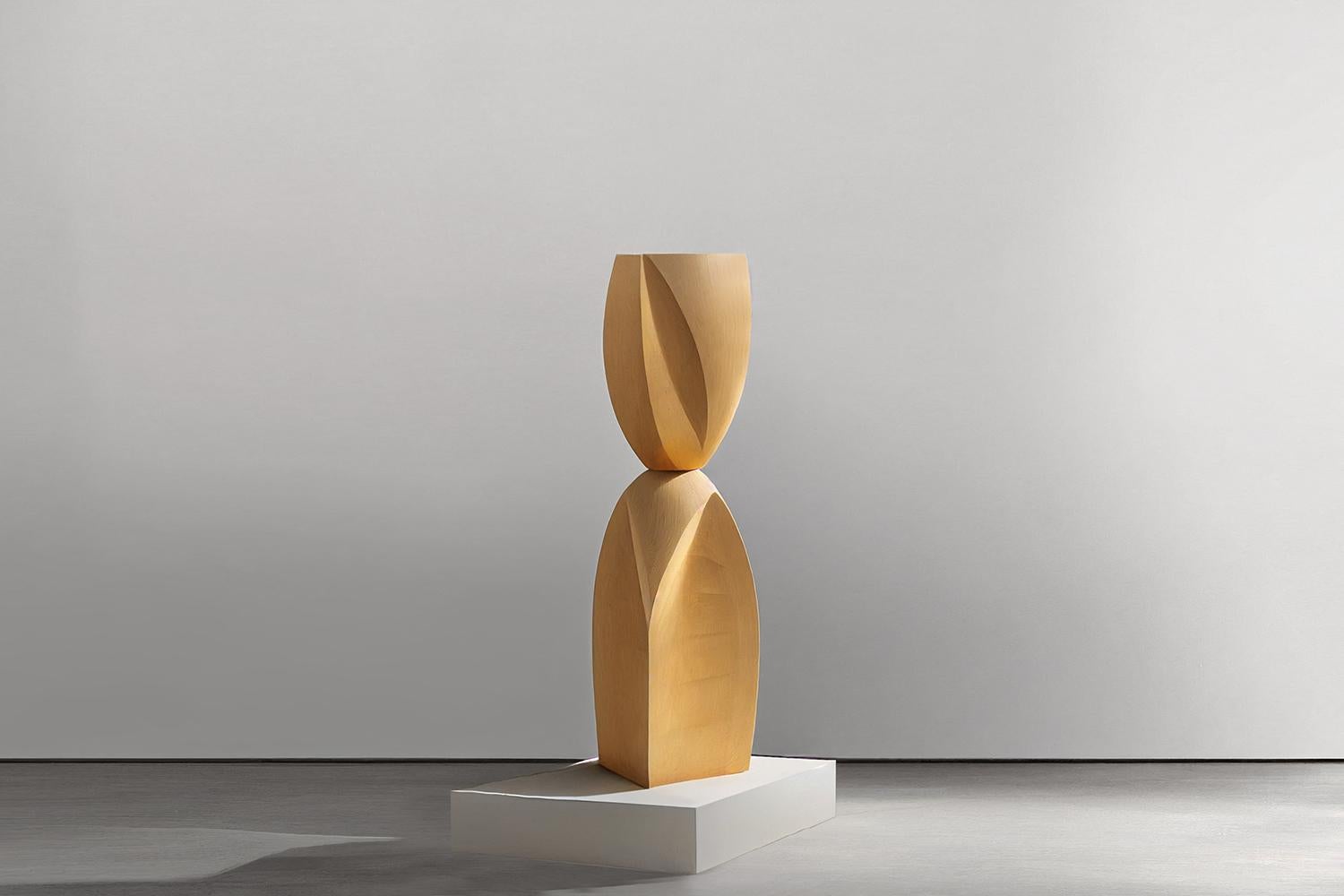 This monolithic sculpture, designed by the talented Artist Joel Escalona, is a towering example of beauty in craftsmanship. Hand and digital machine made; the standing sculpture stands tall as a monument to the skill of the artist. The wood carved