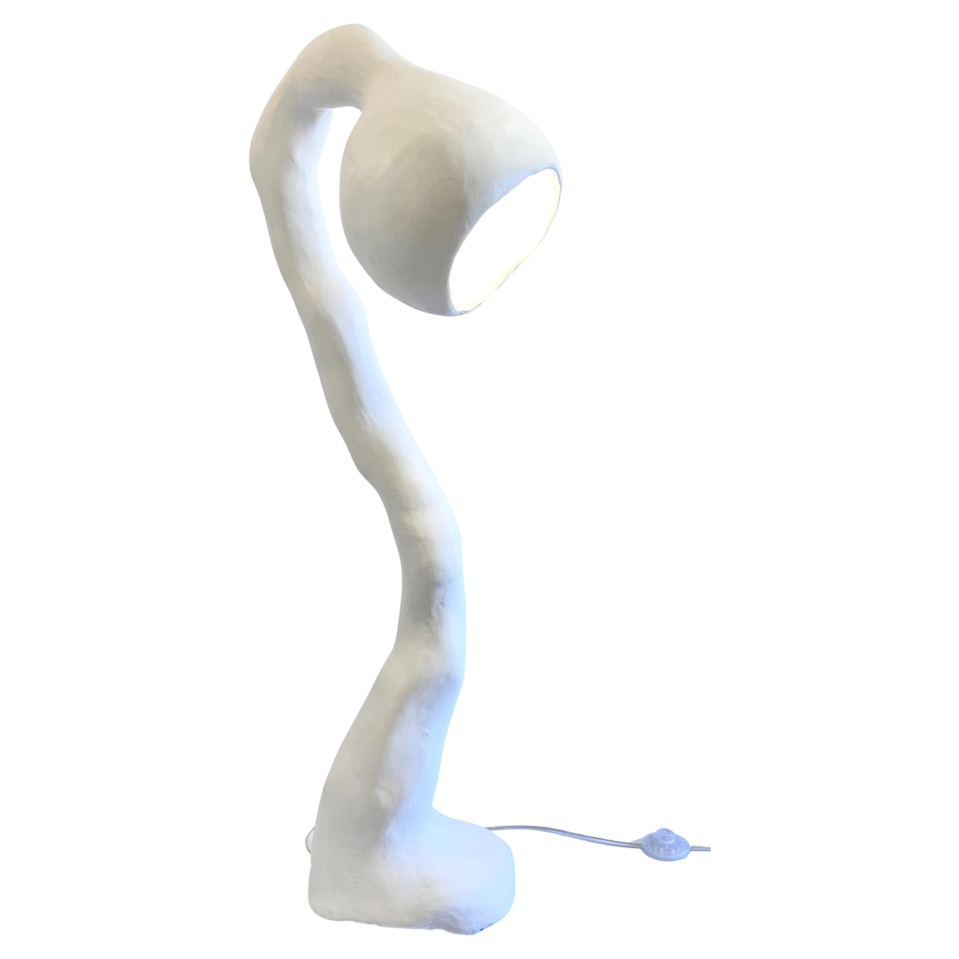 N.004 Floor Lamp from the Biomorphic Series by Studio Chora is inspired by the nature of human experience. This is a second-generation light sculpture that is hand crafted from a composite plaster-based stone. The stone composite is more durable