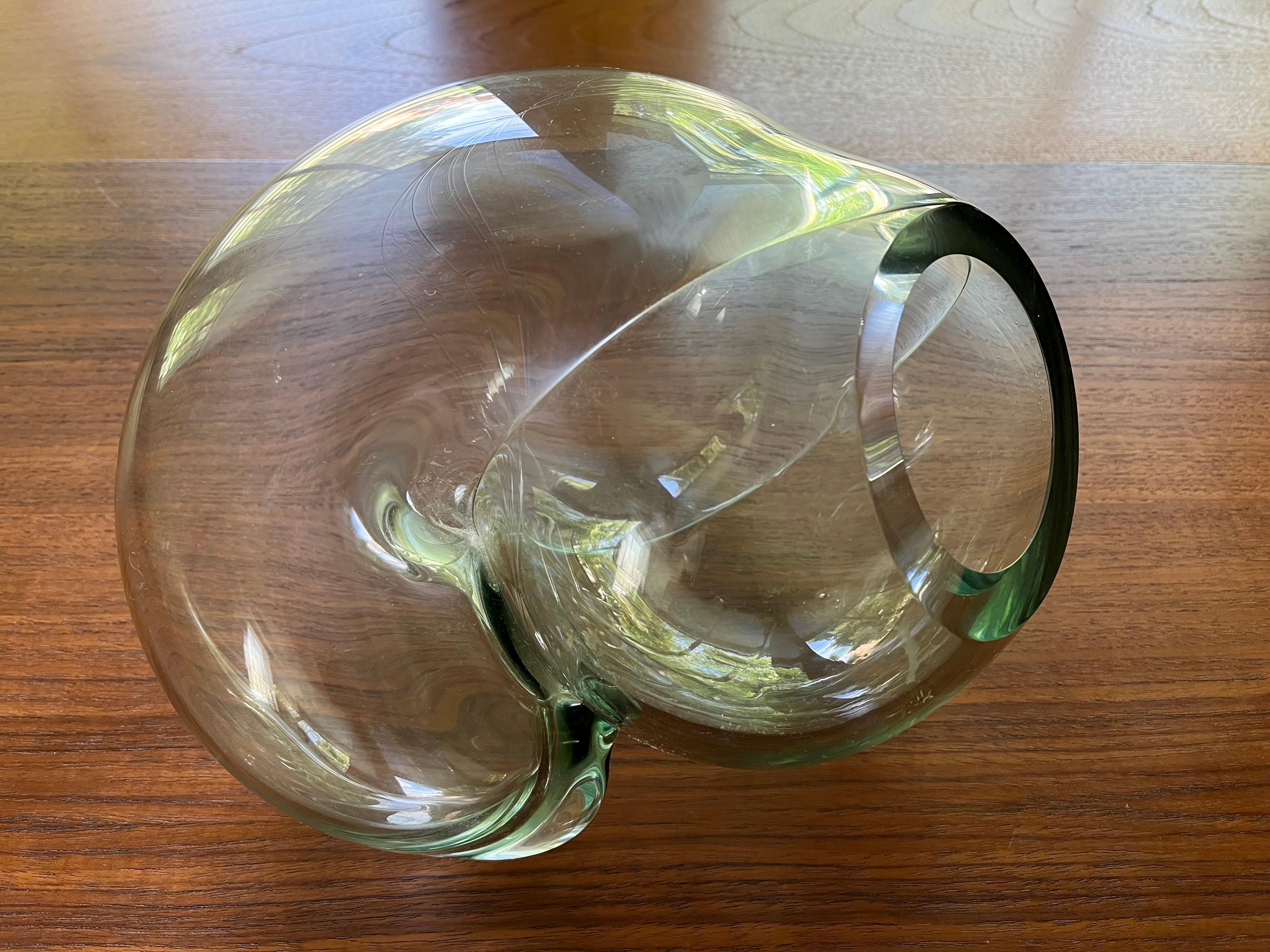 Large clear art glass orb / vessel sculpture by New Mexico Artist John Bingham. 

This hand blown glass sculpture has a Biomorphic free form design and is in very good condition. Approximate size is 10