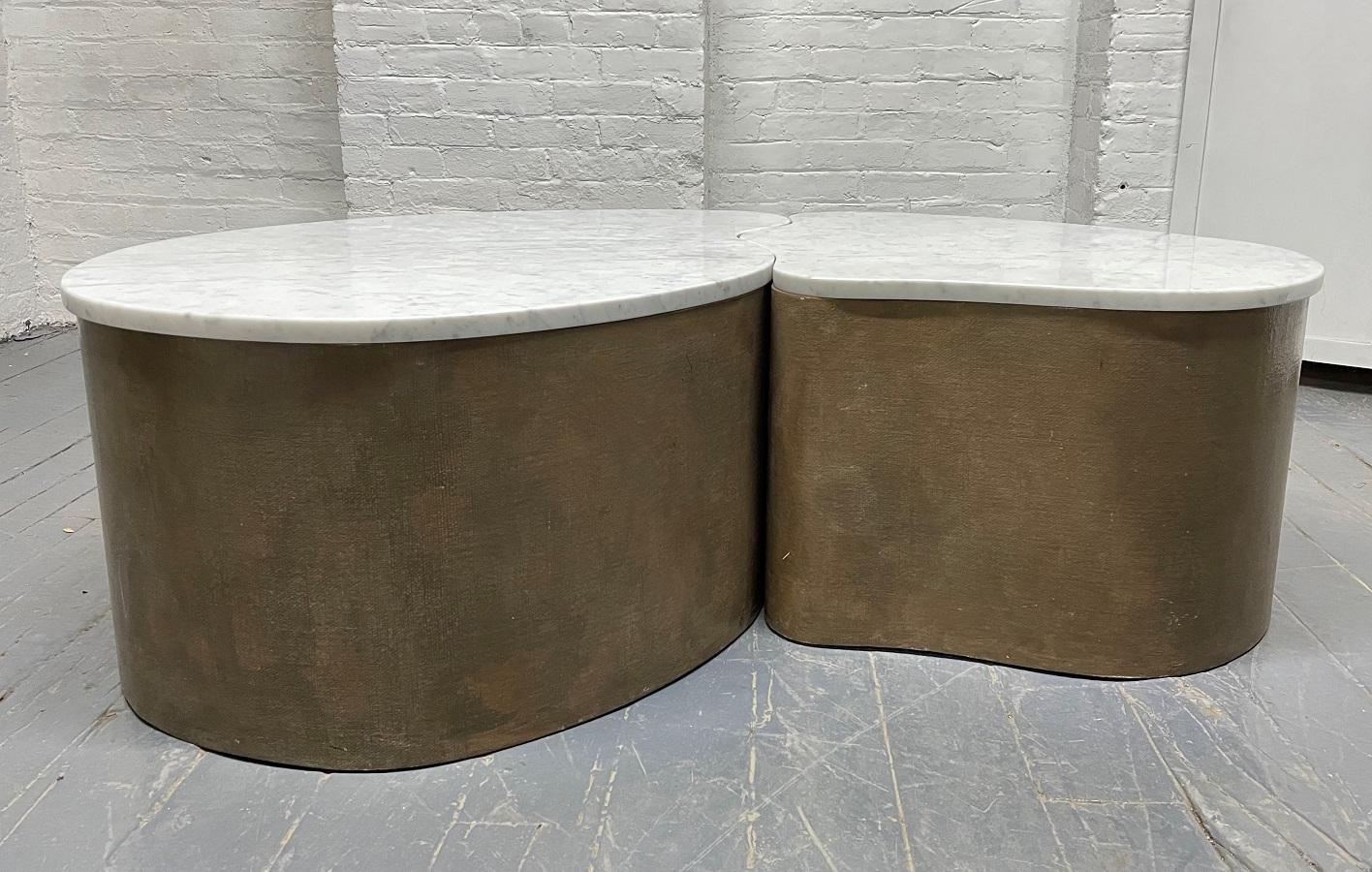 Biomorphic Grasscloth and Carrara marble-top coffee table. The tables have grasscloth bases and can be used together or separately as end tables.