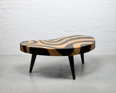 Biomorphic kidney-shaped coffee table with faux eggshell lacquer mosaic pattern