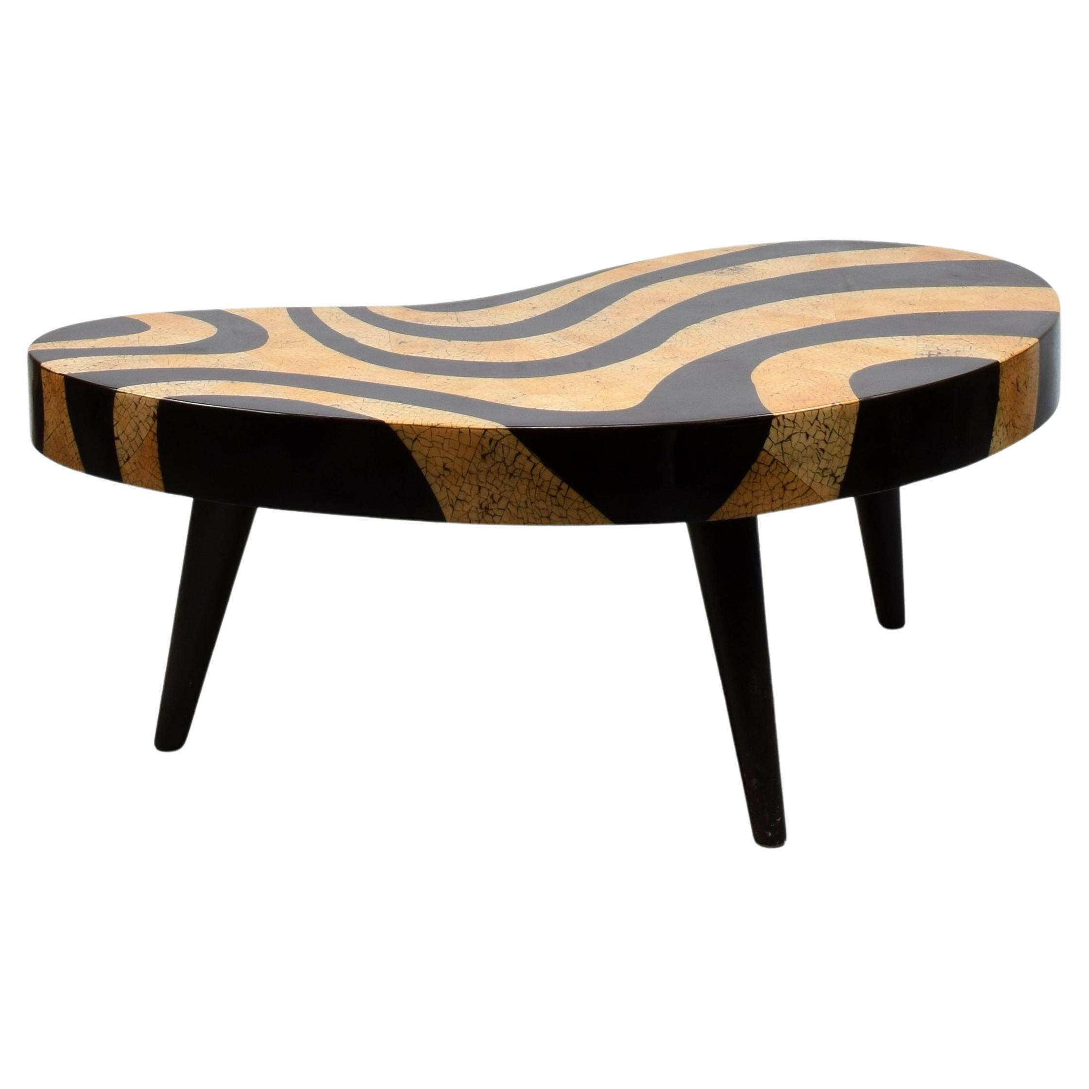Biomorphic kidney-shaped coffee table with faux eggshell lacquer mosaic pattern For Sale