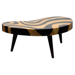 Biomorphic kidney-shaped coffee table with faux eggshell lacquer mosaic pattern