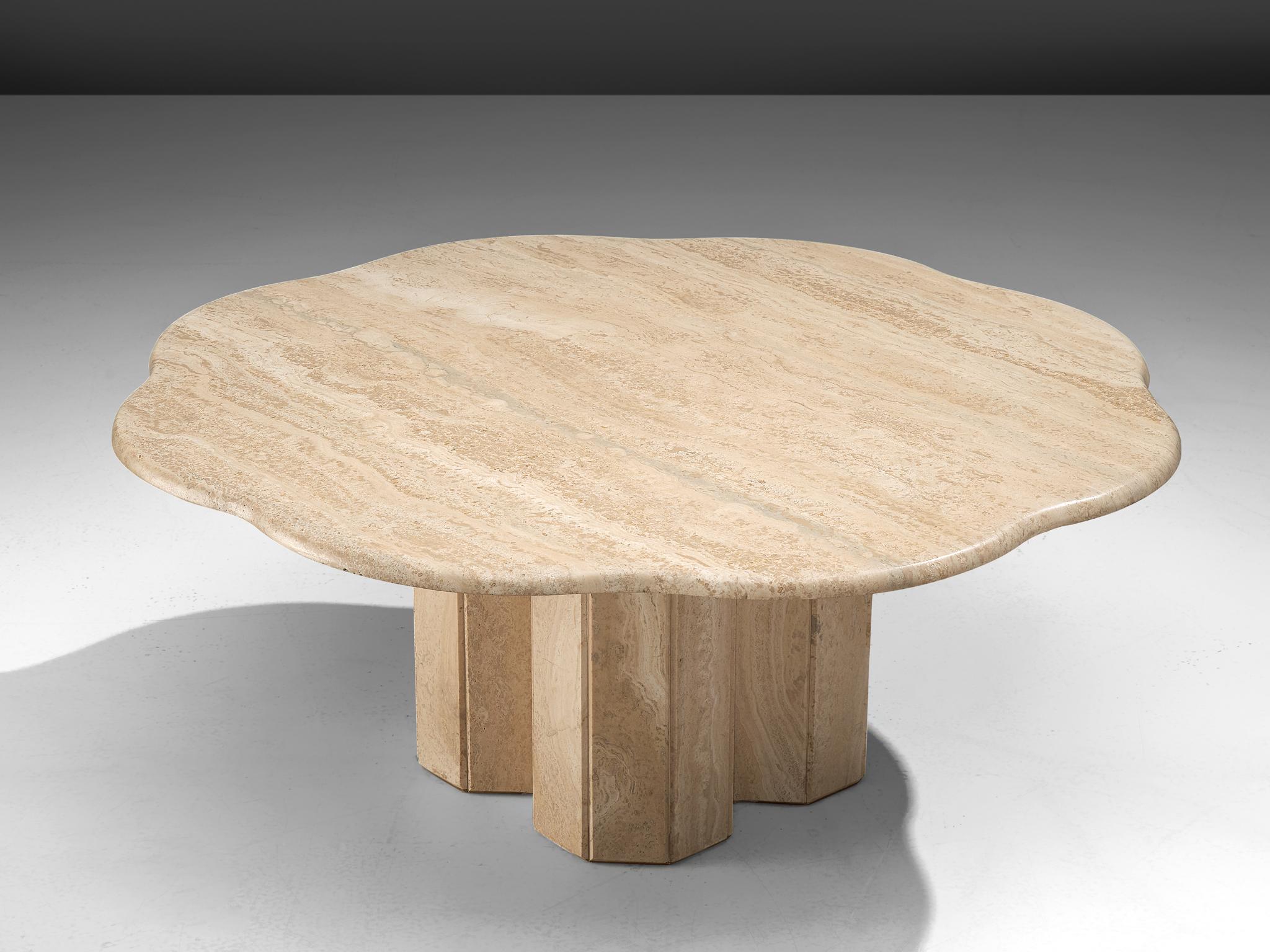 Coffee table, travertine, Europe, 1970s. 

Stunning coffee table with a biomorphic, flower inspired shaped table top. The clover-shaped base is made of travertine as well, but is build up of strokes. This is a nice, subtle contrast between the
