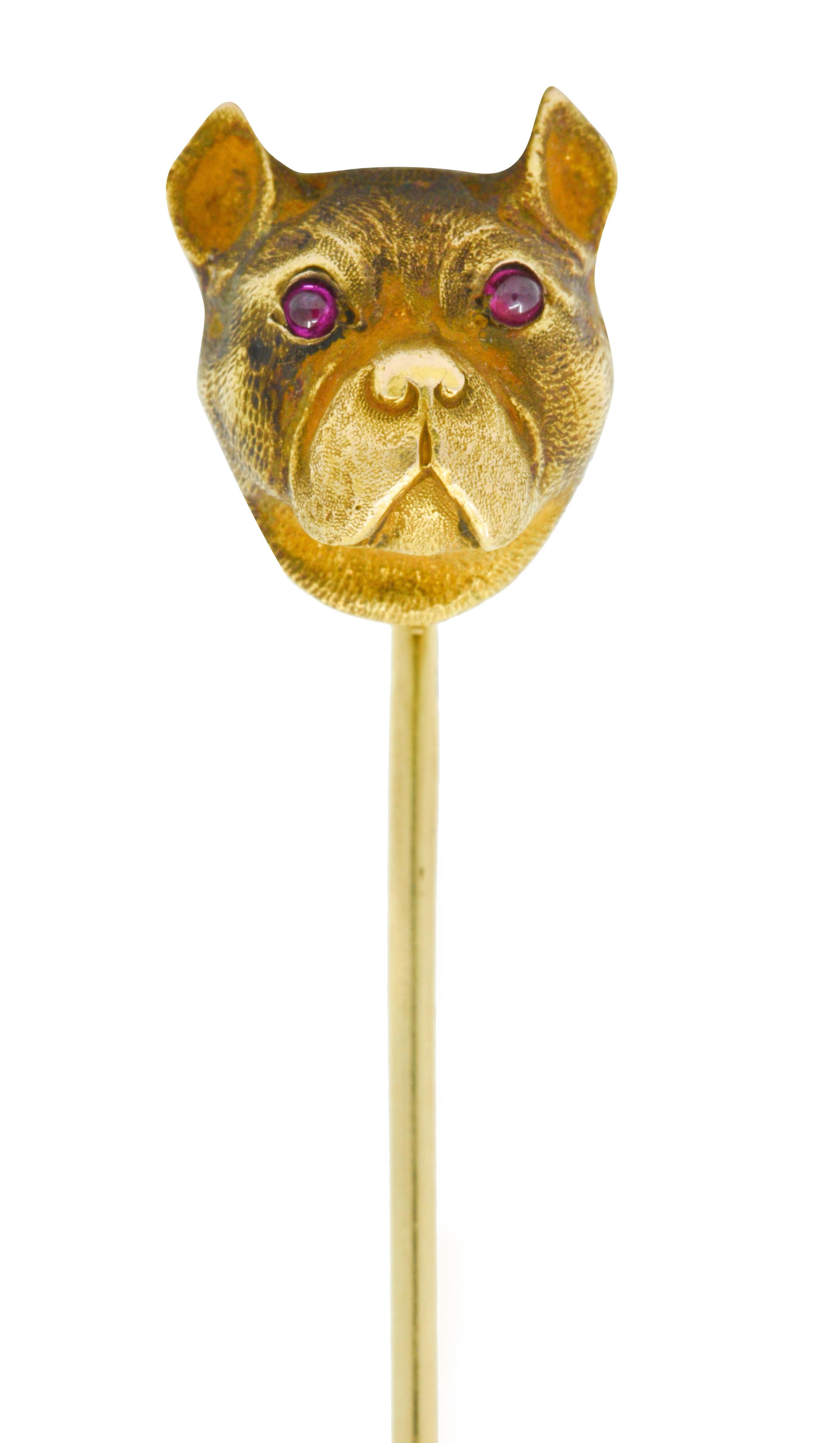 Depicting a highly rendered bust of a French Bulldog

With ruby cabochon eye accents

Stamped 14K for 14 karat gold

Maker's mark for Bippart & Co.

Circa: 1905

Dog measures: 7/16 x 1/2 inch

Total length: 2 1/4 inches

Total weight: 3.6