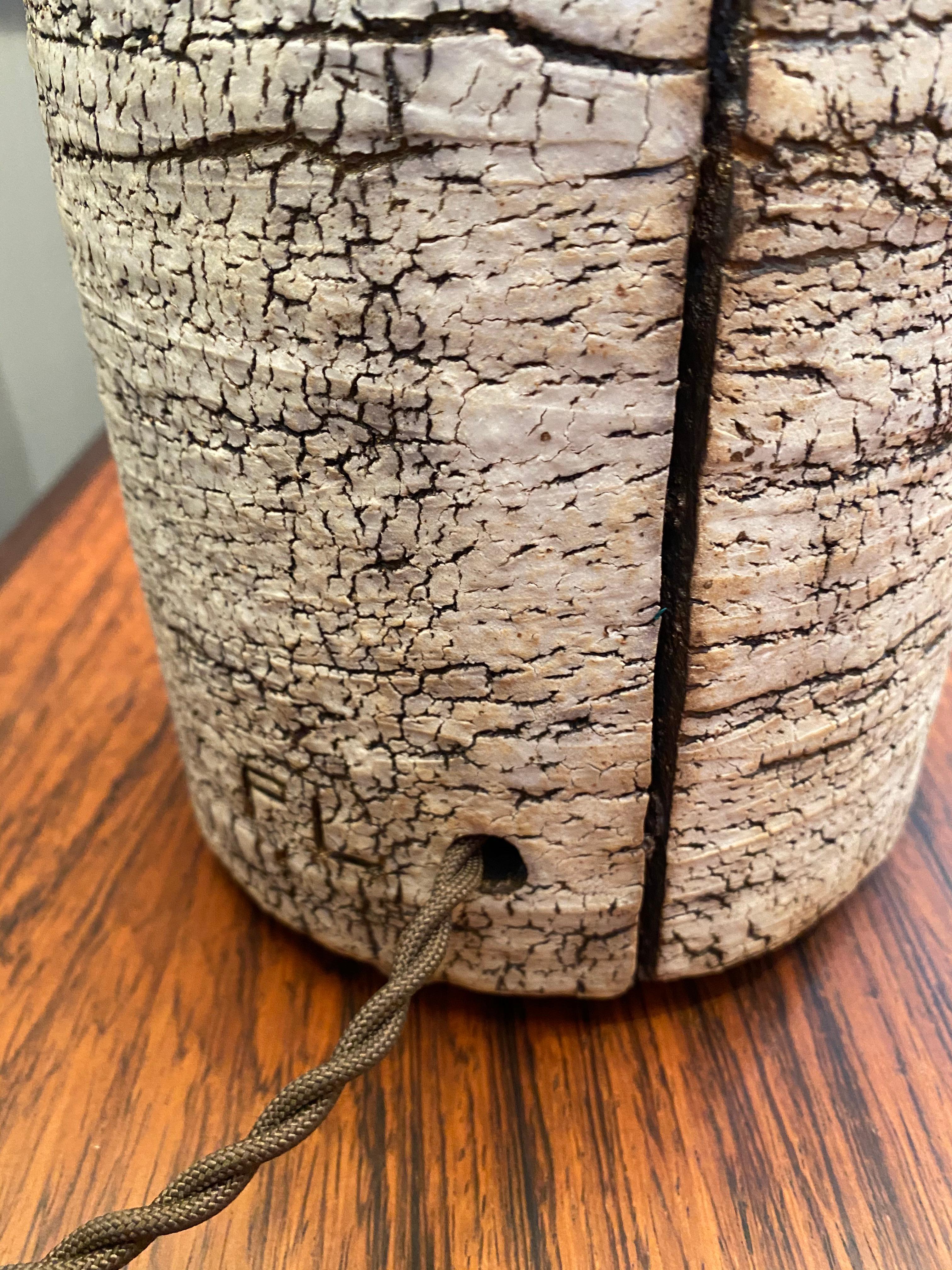 Peter Lane is an American ceramic artist whose pieces act as both works of Fine Art and as anchors to interior spaces, He introduced the birch bark finish in mid-2000s and this particular lamp is from his archive. He has become known for monumental