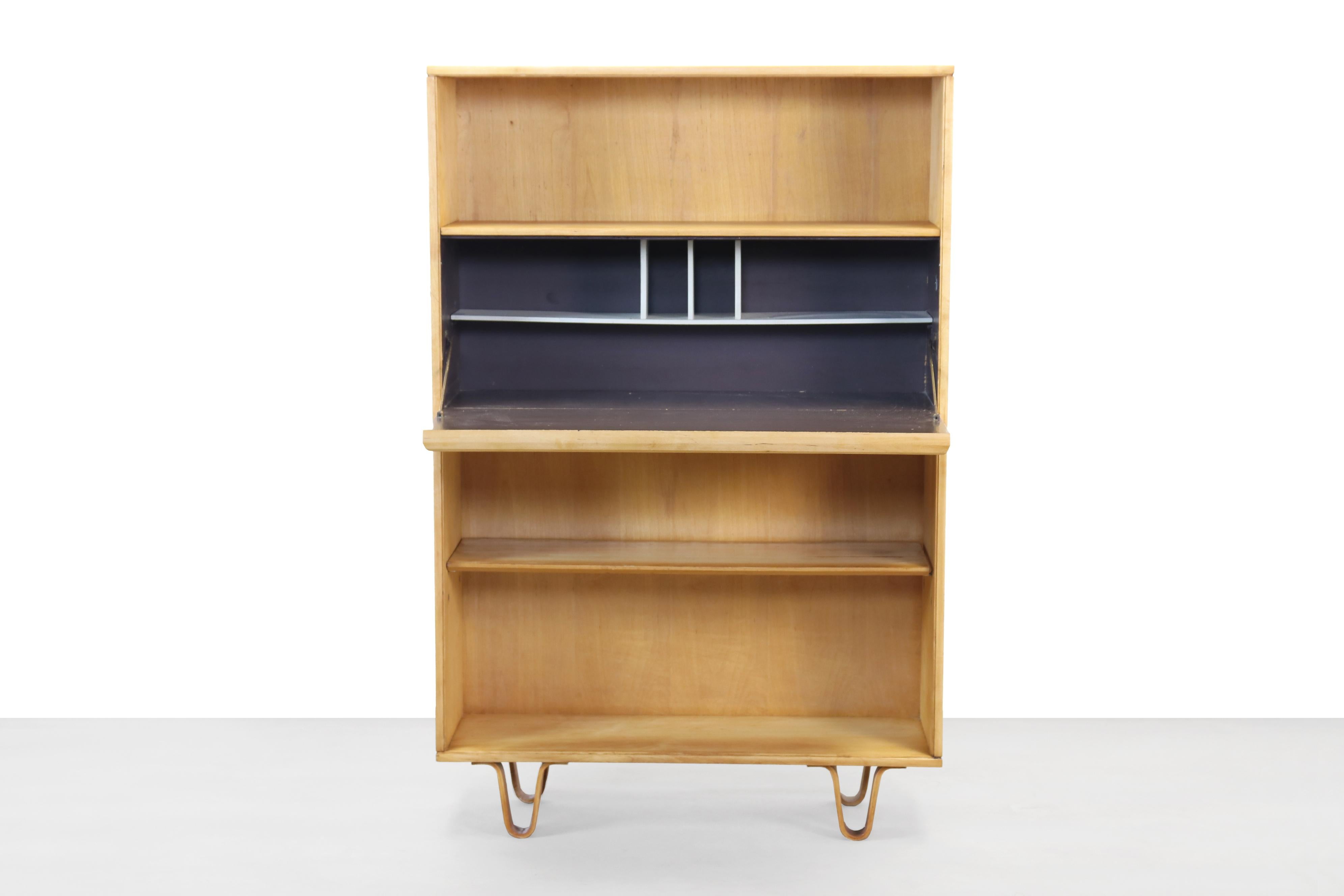 Very nice secretary by Cees Braakman from the famous Pastoe Birch series. The curved birch wood legs are characteristic of this series. This beautiful cabinet can be used for storage, but the lid with the handy storage compartment makes this cabinet