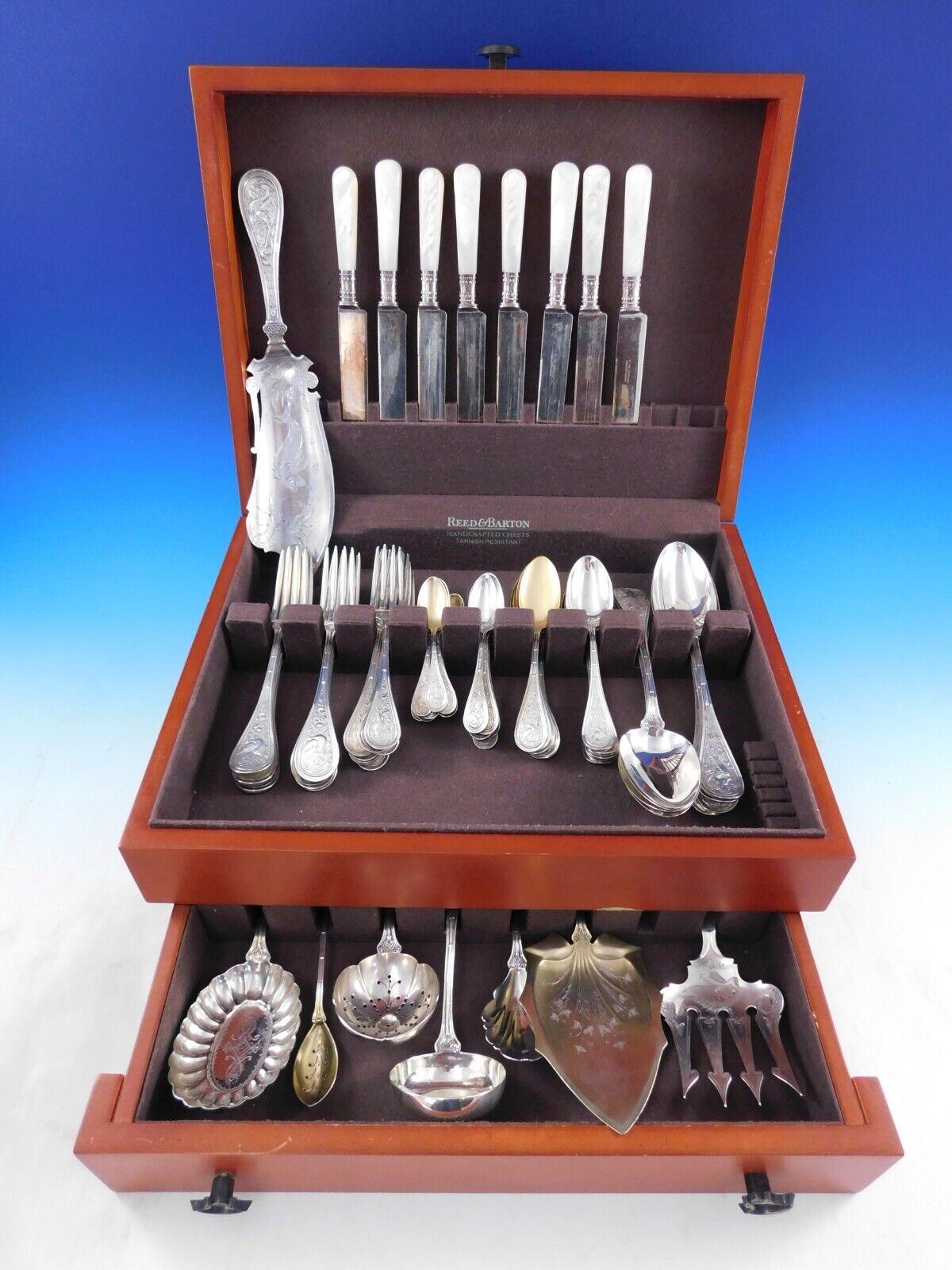 Rare Bird by Wendt, circa 1872, sterling silver Flatware set - 72 pieces. This multi-motif Japonesque pattern has a bamboo design running up the handle, with a swooping or plunging bird amidst assorted flora. This set includes:

8 Knives, flat