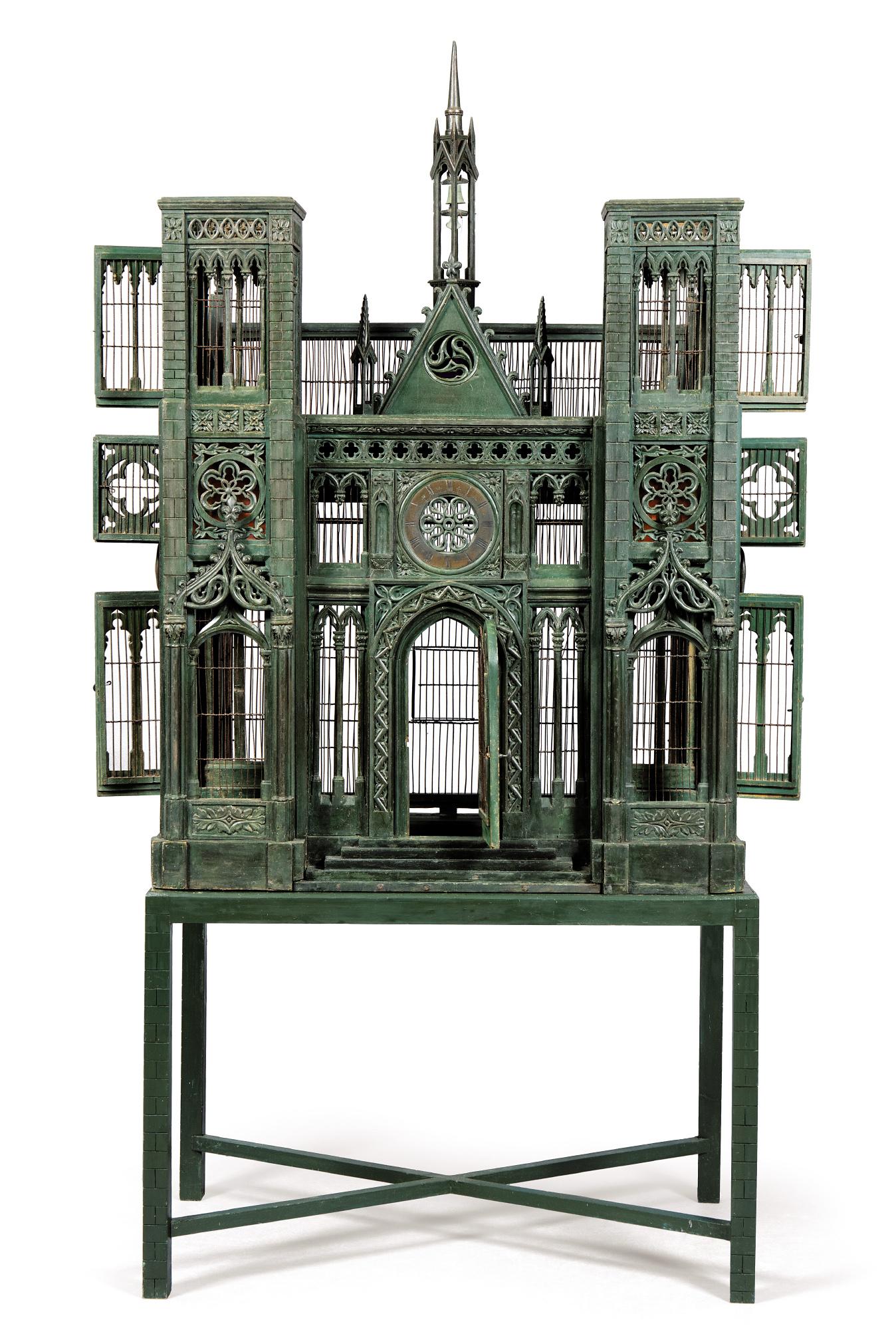 A neo gothic dark green painted Birdcage worked like Notre Dame Notre Dame
Very rare bird cage, neo gothic, dark green painted on a pedestal of later date.
The object is highly decorative and in a good overall condition.
   