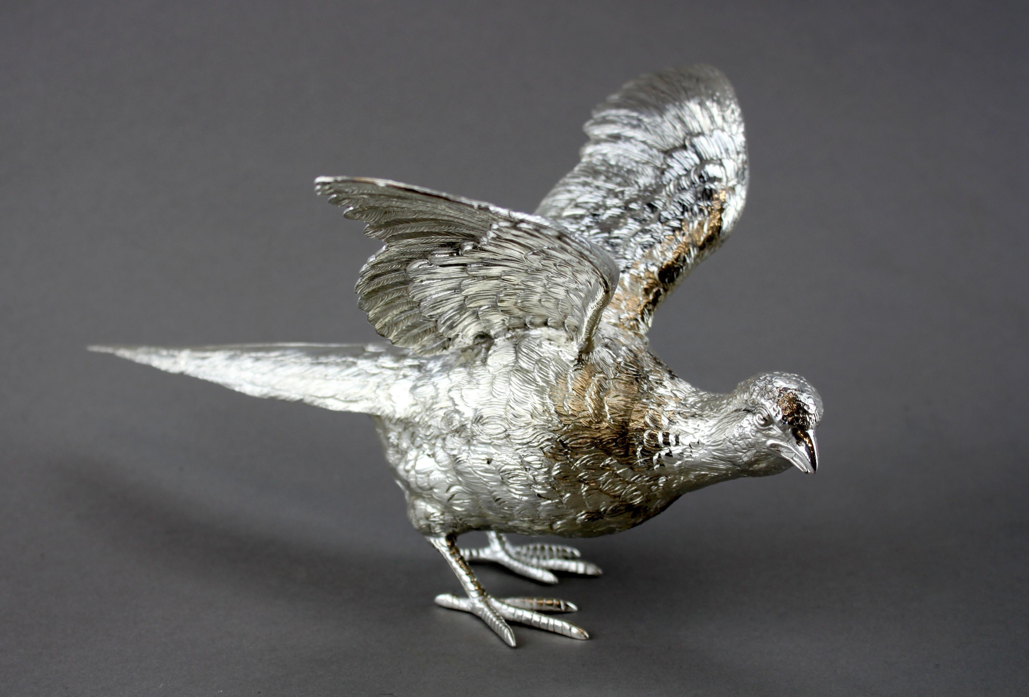 Sterling silver bird figurine
Maker: C J Vander LTD
Made in London 2018
Fully hallmarked.

Dimensions: 
Length 28.5 cm
Width 21 cm
Height 15 cm
Weight 1056 grams

Condition: Bird figurine is pre-owned, general used, no damage, excellent