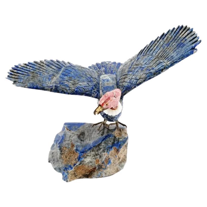Vogel, handgeschnitzte Rhodonit-Figur aus Lapislazuli