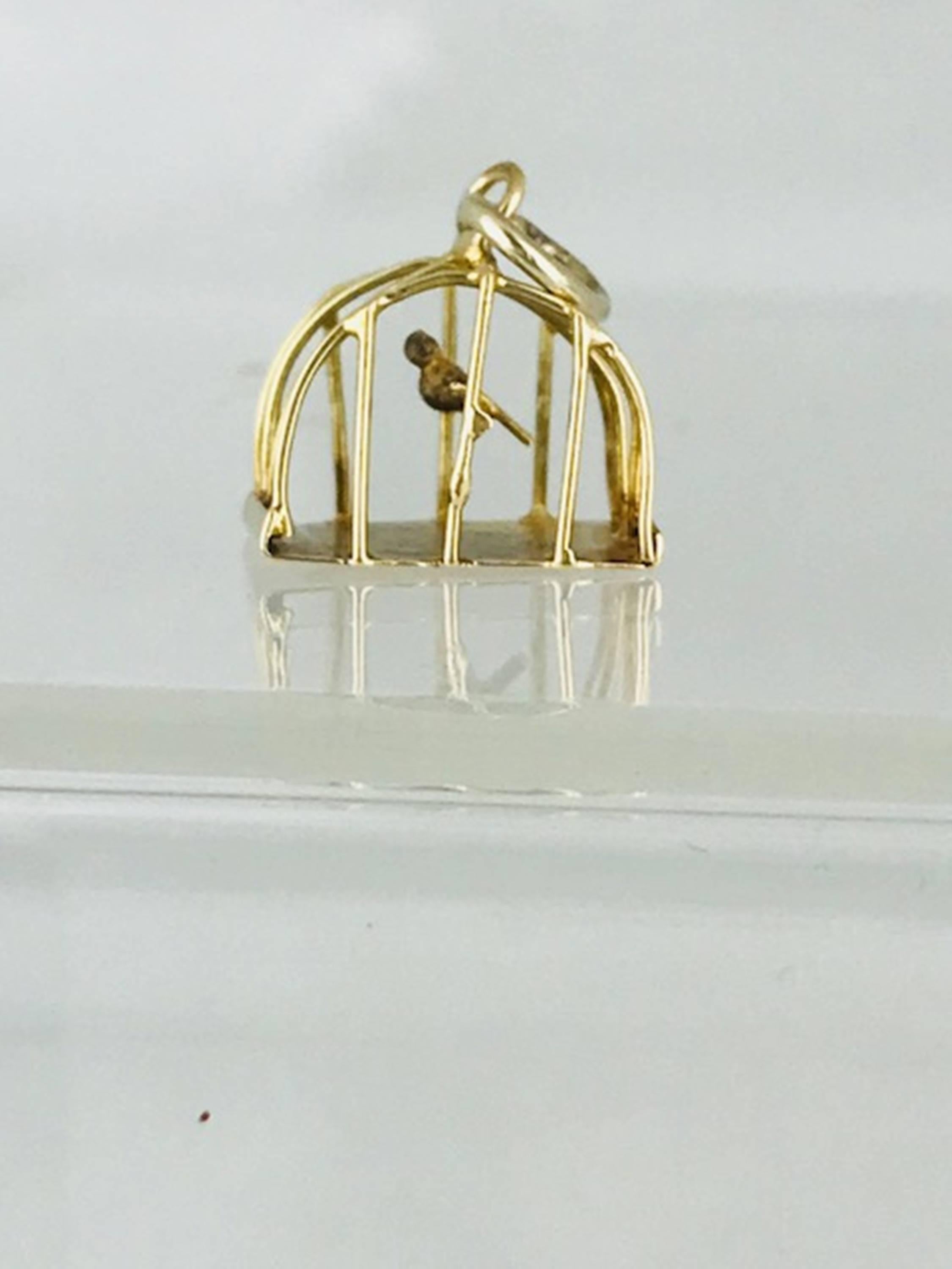 Bird in a cage, 14 Karat Yellow Gold, Circa 1950's
Vintage, unique and hard to find Bird-Cage can be used for charm bracelet or necklace

GIA Gemologist, inspected & evaluated