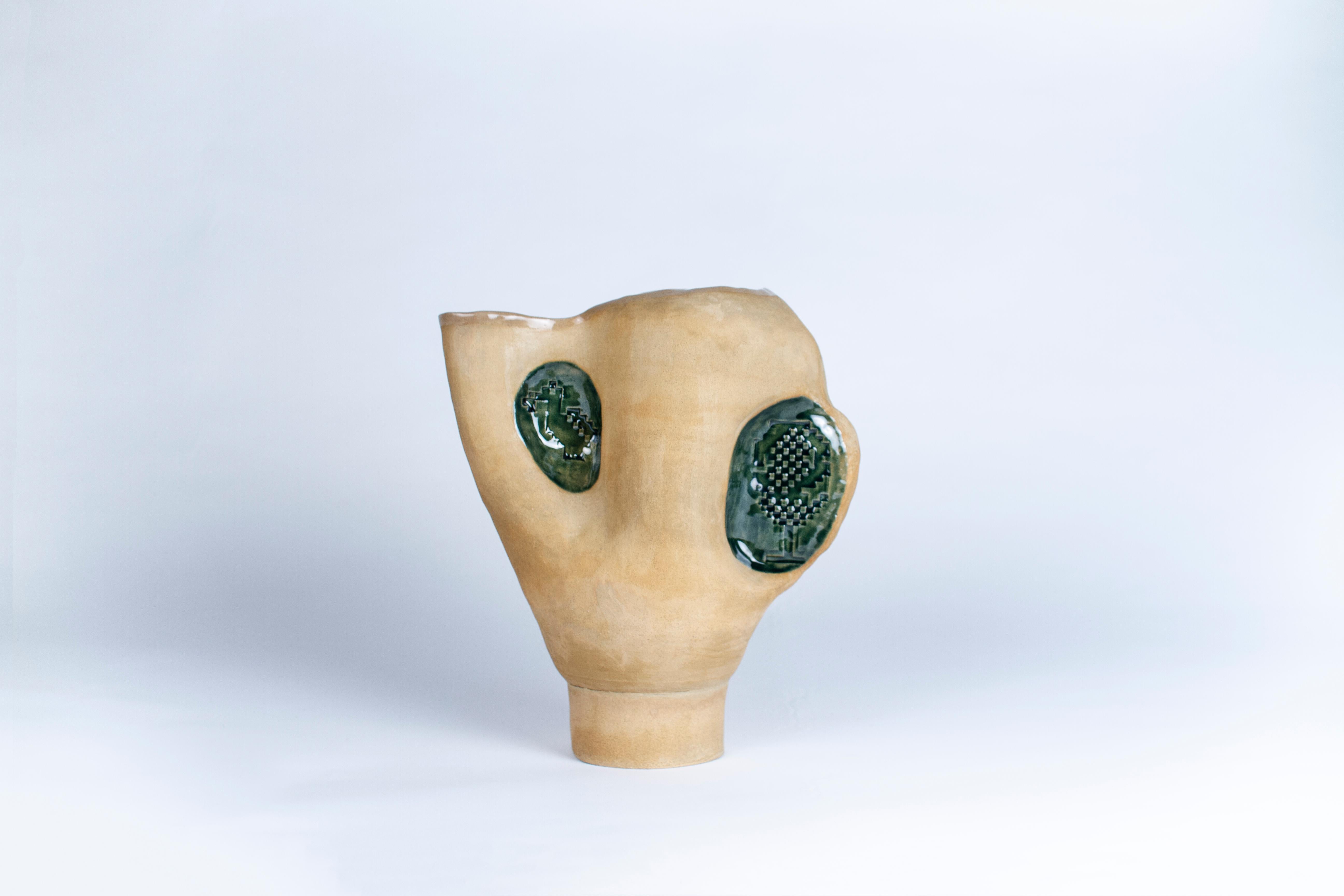 Bird jug vase by Faissal El-Malak
Dimensions: 28 x 15 x 33 cm
Materials: Ceramic

Faissal El-Malak is a Palestinian designer who was brought up between Montreal Canada and Doha Qatar. He trained as a fashion designer in Paris’ Atelier Chardon