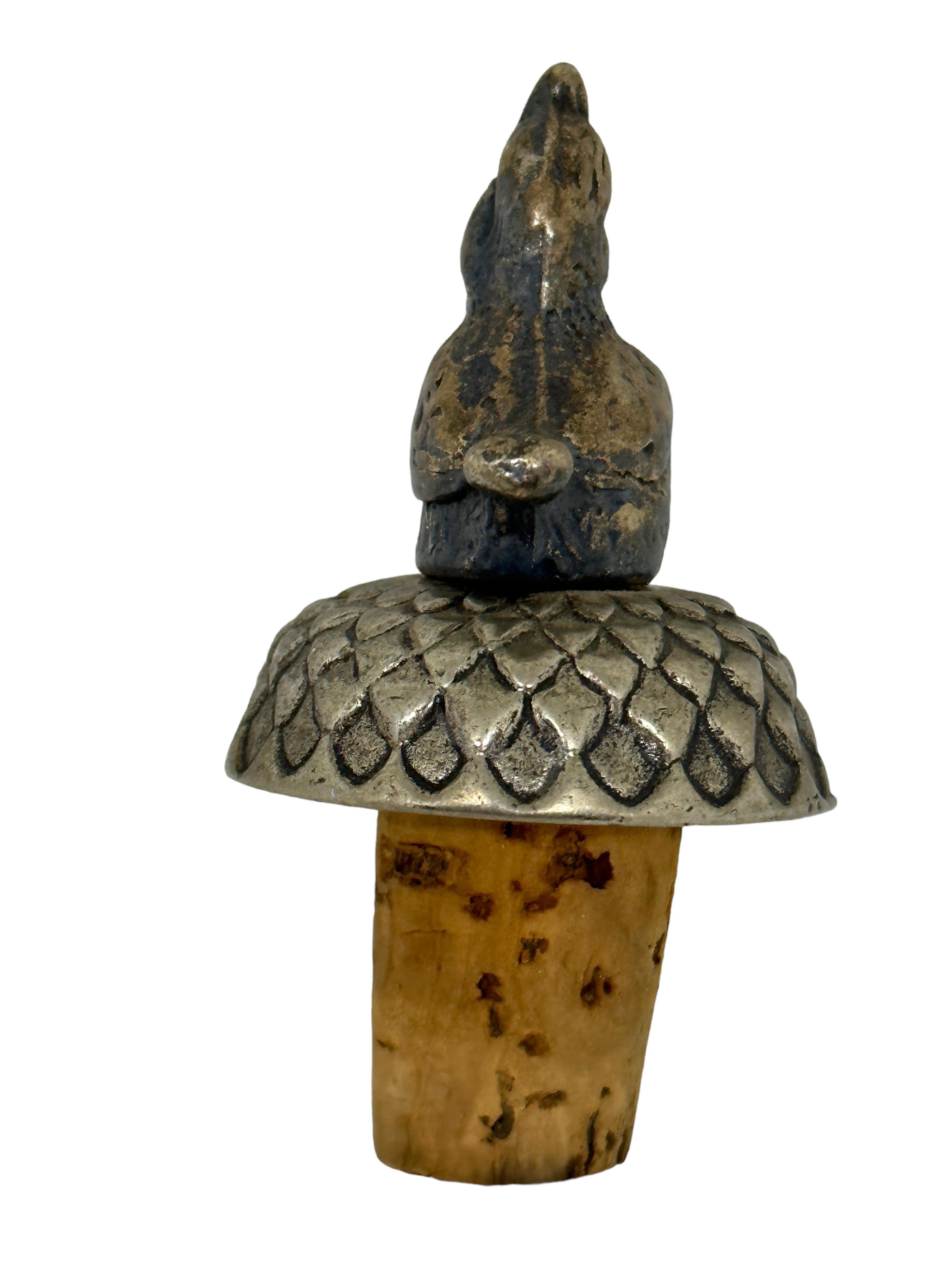 A beautiful metal and cork bottle stopper. Some wear with a nice patina, but this is old-age. Made of metal and cork, silver plated. A beautiful nice barware item or just a display item in your collections of antique and vintage bottle stoppers.
