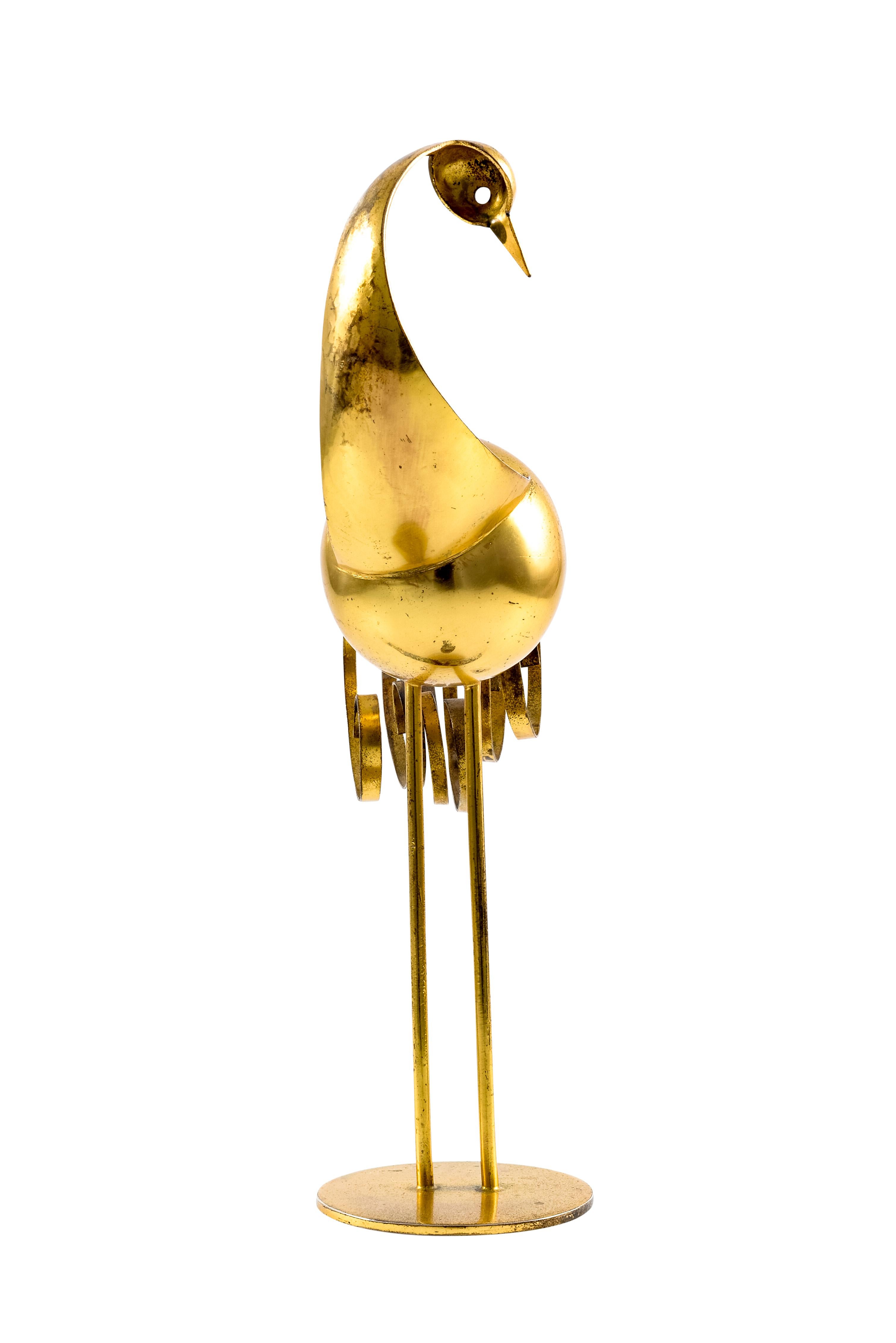Bird sculpture designed by Franz Hagenauer manufactured by Werkstatte Hagenauer Wien Austrian Art Deco 1930s Brass-plated Alpacca 

Stylized animal depictions in metal and wood were typical products of the Werkstatte Hagenauer Wien. One of the