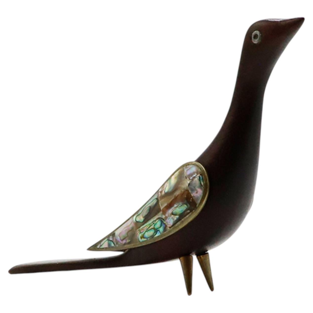 Escultura de un pájaro en caoba tallada con incrustaciones de concha de abulón – Los Castillos, Taxco en venta