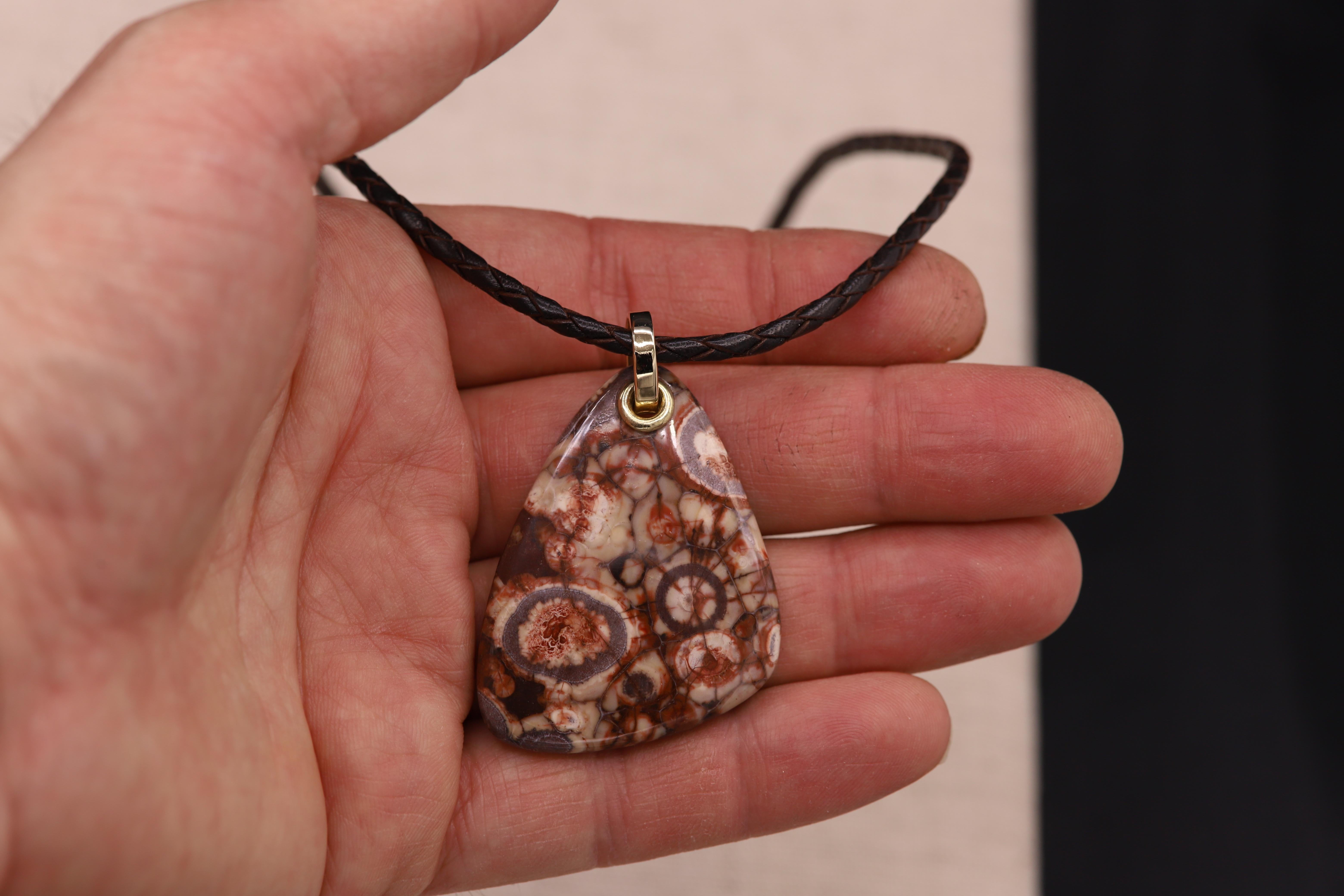 One-of-a kind- natural Beautiful Birds Eye Jasper stone Necklace.
all parts are 14k Yellow Gold and Italian-made leather cord.
Adjustable length 17' - 19' inch and all sizes in between, cord is dark brown.
Jasper stone is approx 1.75' x 1.5' inch -