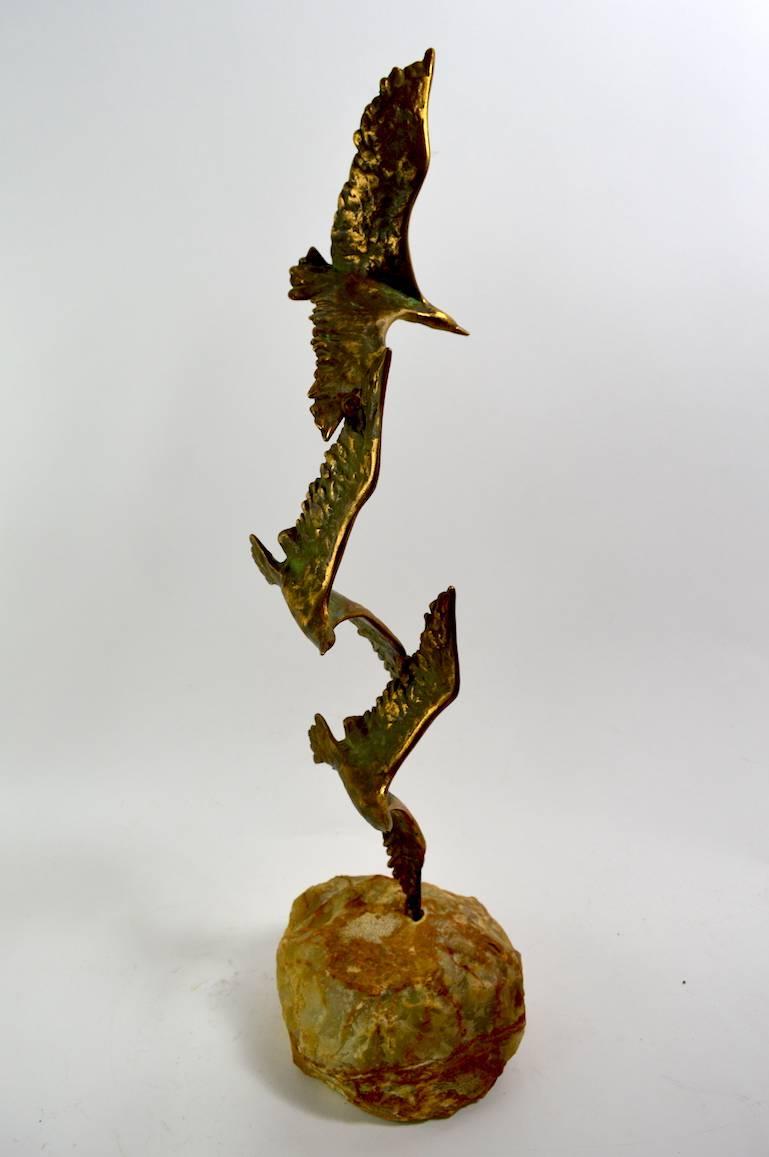 Cast brass, or bronze, birds mounted on rock base, with original Curtis Jere label. Excellent original condition with great patina. Jere from the Brutalist period, nice table top scale, clean ready to enjoy.
