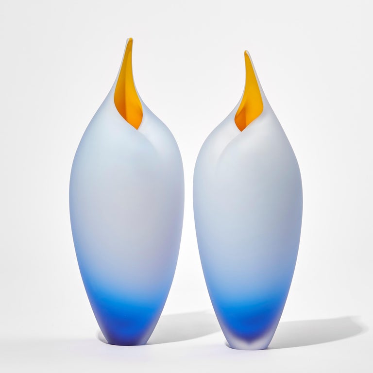 Tall Birds in Soft Blue & Yellow are a unique pair of hand blown art glass sculptures by the South African artist Bruce Marks, who is based in the UK.

The dims shown are for the tallest bird. The size for each Bird is:
Left: 41.5cm H, 15.5cm ø
