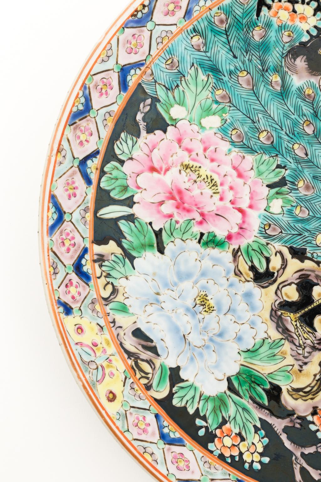 Vintage oriental charger. Depicted birds of paradise with vibrant flowers and ferns. Hand-painted.
 