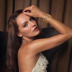 Pulsera brazalete ancha de oro rosa con zafiros rosas y diamantes Aves del Paraíso