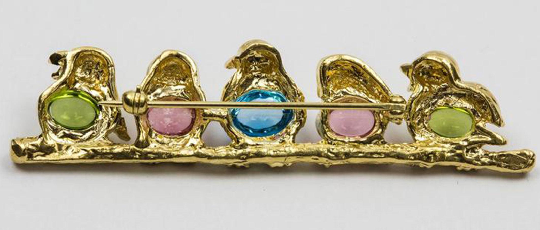 Adorable Birds on Branch bezel set with Peridot, Pink Tourmaline and Blue Topaz, Ruby set eyes; approx. 2.5” long. Finely hand crafted by Coach House in 18K Yellow Gold. Approx. weight of pin: 19.94gm. Chic, Fun and Timeless! 