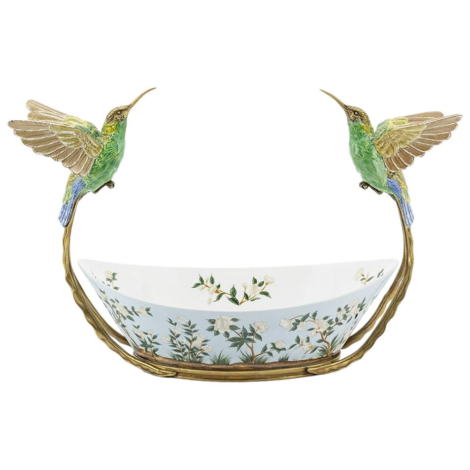 Tasse en porcelaine motif oiseaux avec cadre en bronze