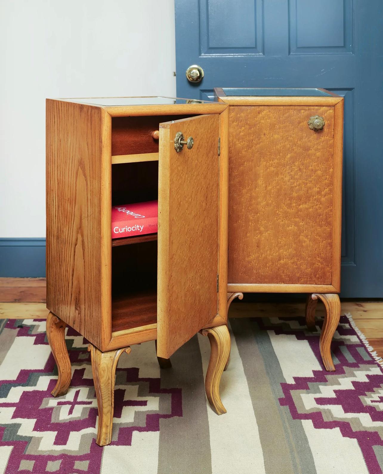 A pair of beautifully elegant rich Maple bedside tables with a fantastic Birdseye pattern on the doors. 

This pair have been lovingly modernised from what was quite an outdated style, the tall boxy backs have been removed and the tops have been