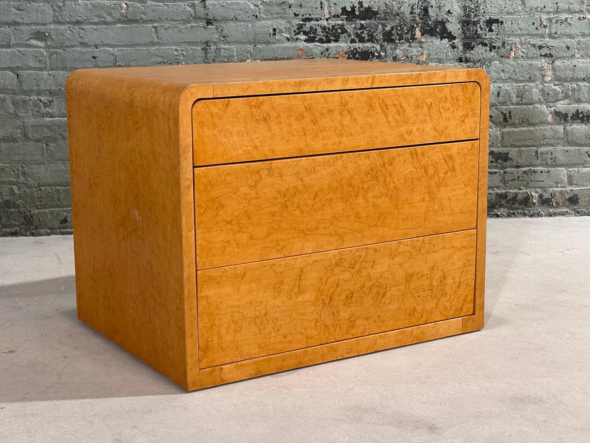 Birdseye Maple Waterfall Night Stand/End Table, 1970.  Original with 3 drawers.
 Birdseye maple waterfall nightstand would be a nightstand made from birdseye maple wood with a design that showcases the wood's natural grain pattern in a flowing
