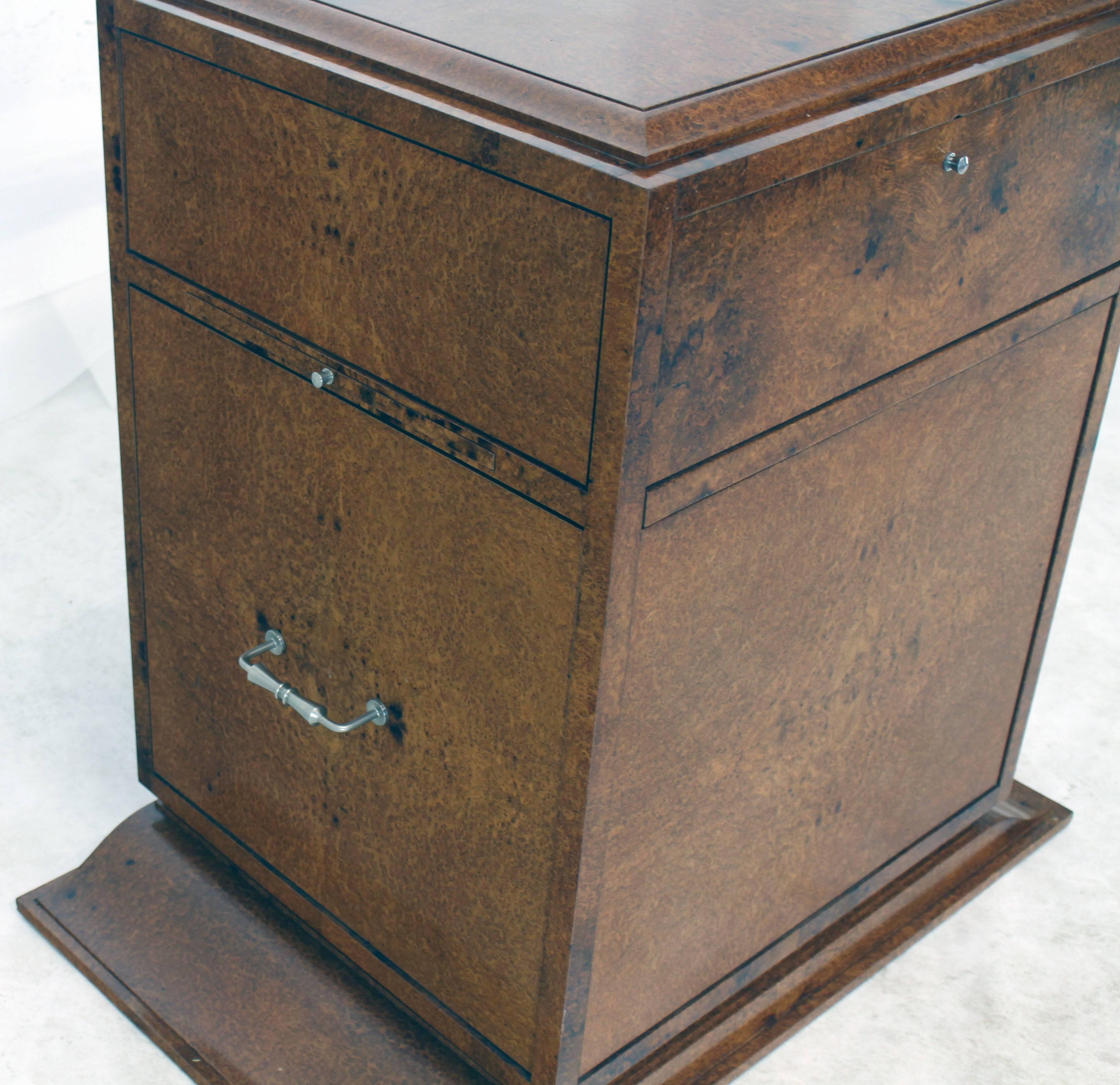 Interesting superb quality modern bird's-eye maple cabinet with many interesting feature and compartments as pictured. It could be used as a nice hall or entry cabinet or a wide pedestal.