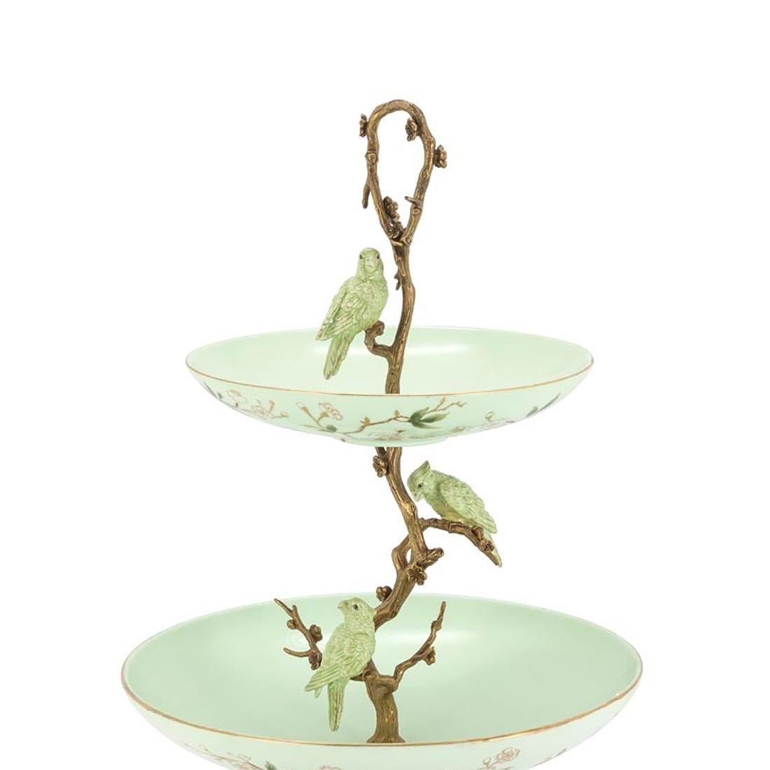 Center table serving piece birdy with
2 plates and base in hand painted enameled
porcelain. With solid bronze structure and details.