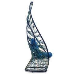 Sedia Birdy con finitura blu o naturale