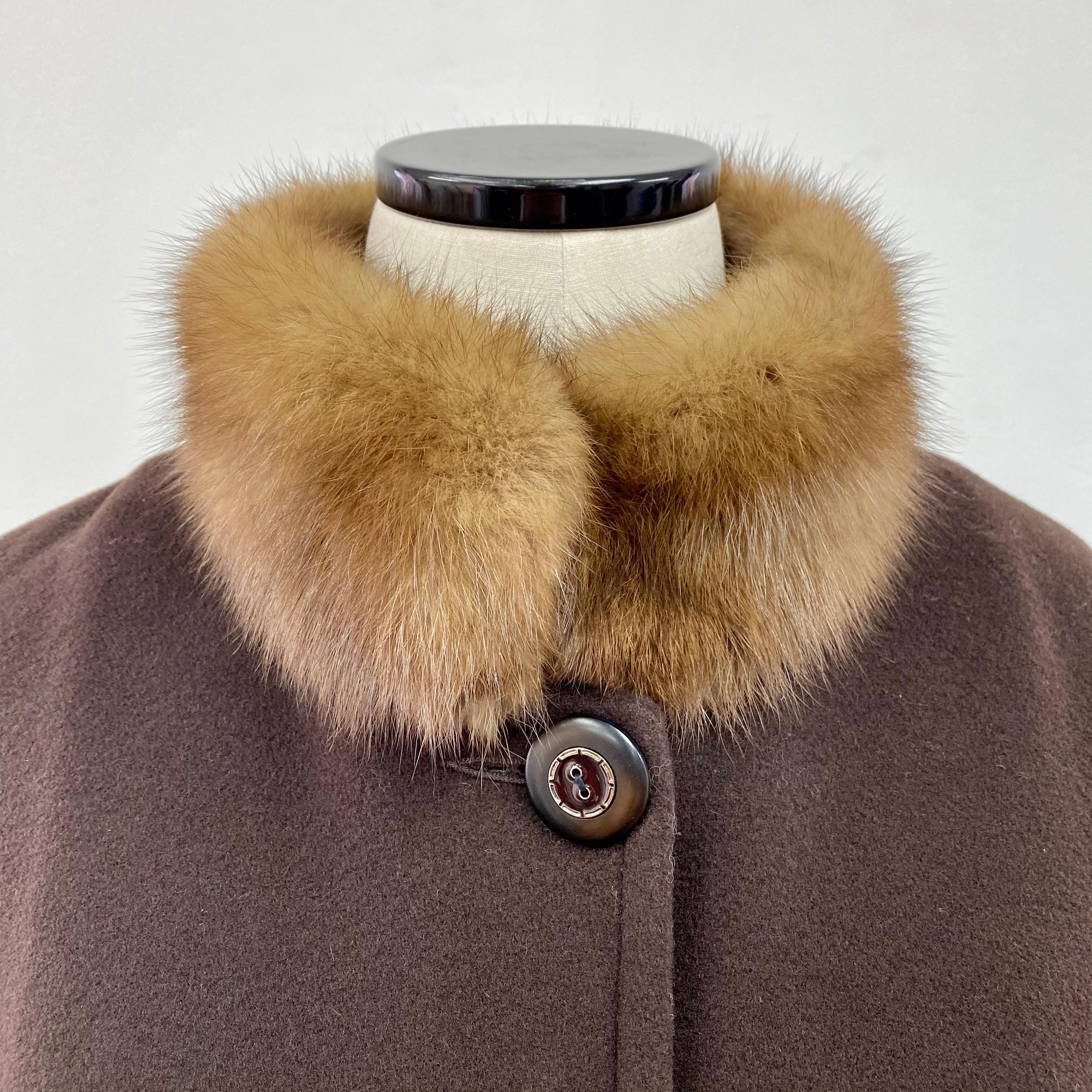 PRODUCT DESCRIPTION:

Brand New glamorous Birger Christensen wool cape with luxurious sable fur collar trim

Condition: Like New

Closure: Two front buttons

Color: Brown and Sable

Material: Cashmere blend and sable fur

Garment type: Cape