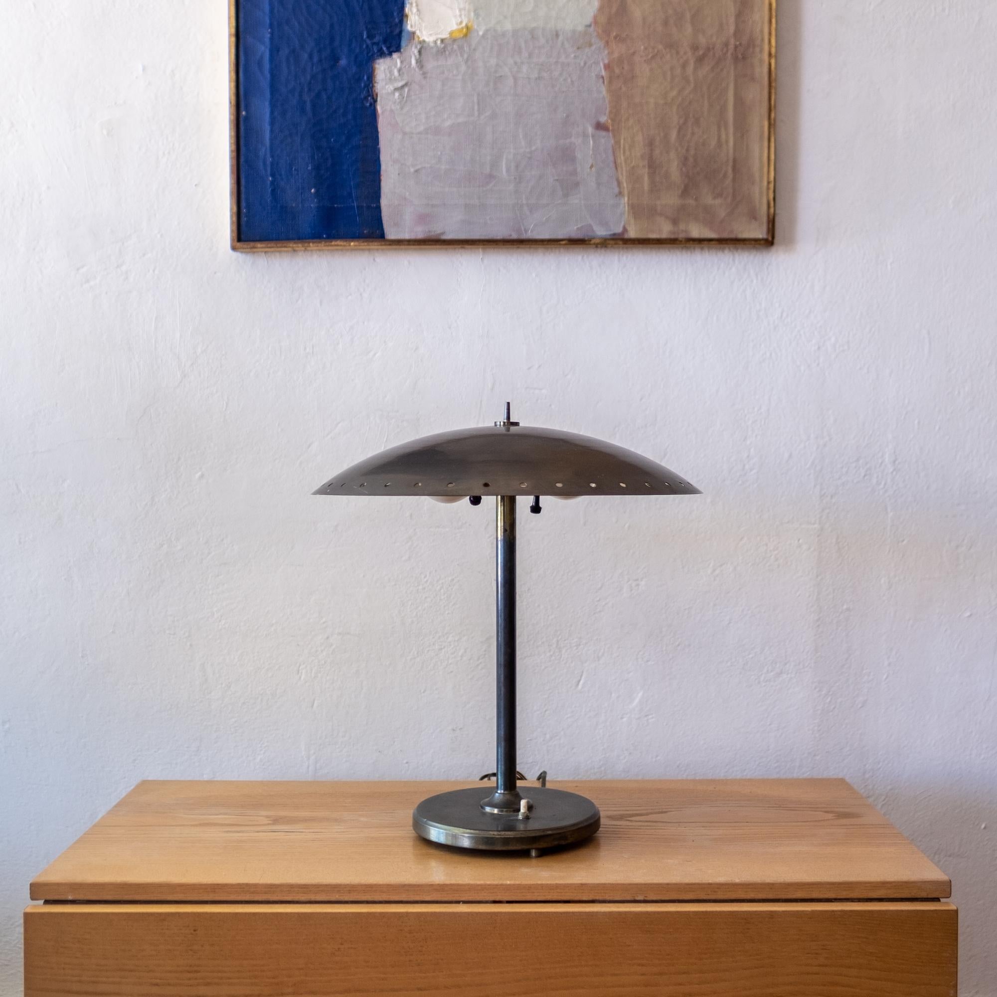 Table or desk lamp designed by Birger Dahl for Sönico. Heavy solid brass construction with a beautiful patina, Norway, 1950s.