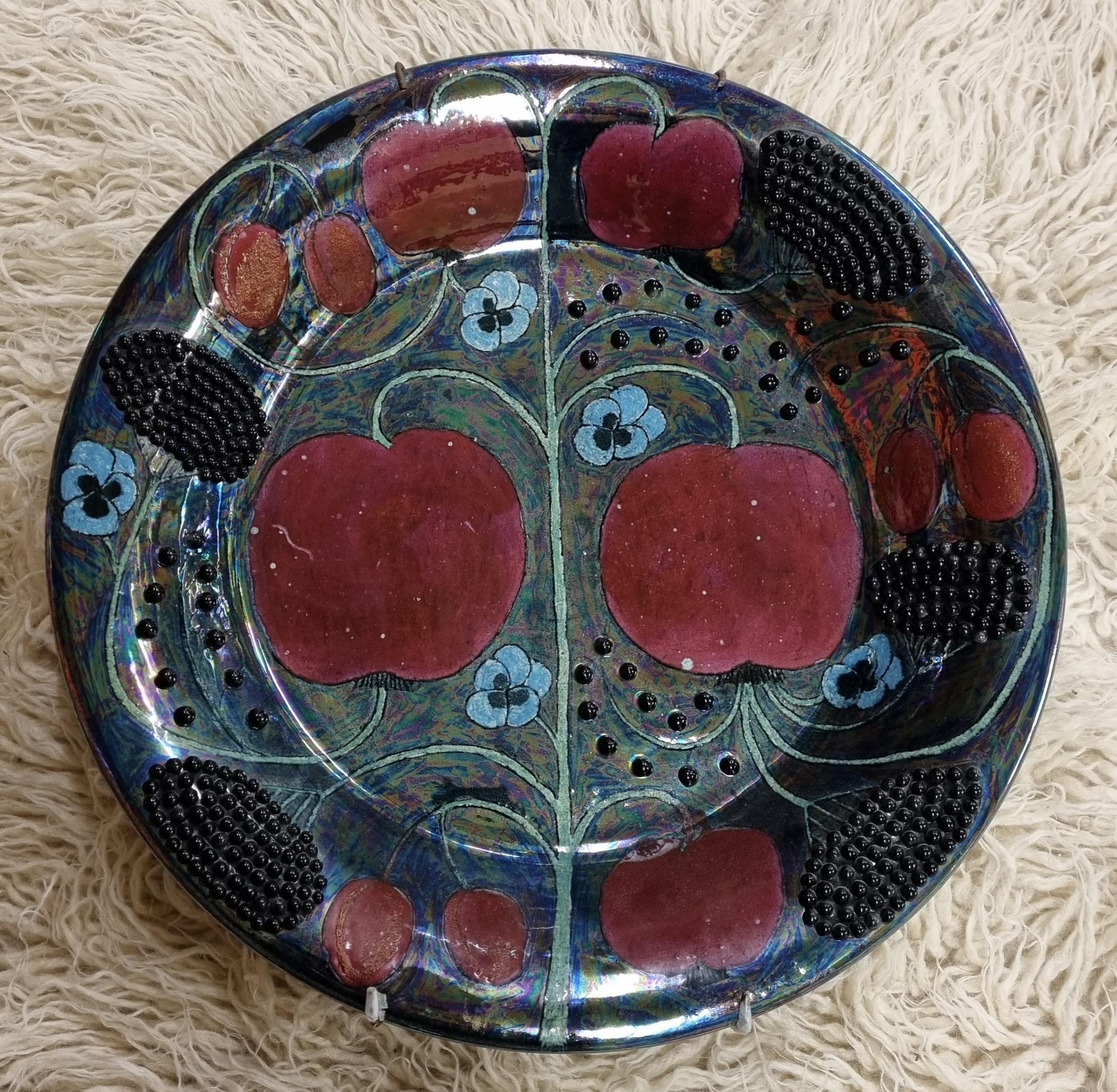 Birger Kaipiainen (1915-1988) was the master of decorative ceramics at the Arabia factory in Finland. He was well known for his ornamental dishes that were rich, colourful and with themes from the fantasy world and fairytales, which actually fought