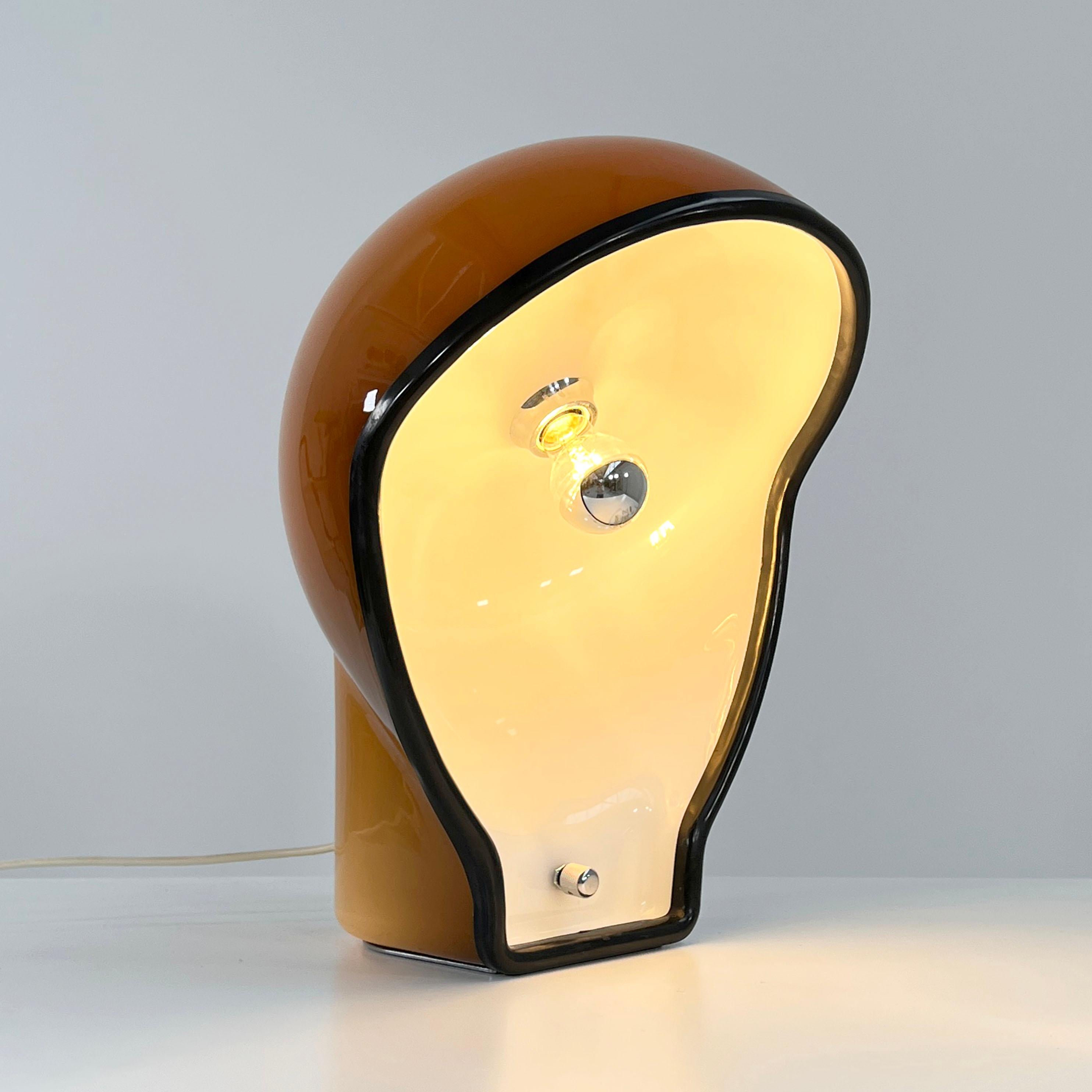 Designer - Fabio Lenci
Producer - Harvey Guzzini
Model - Birghitta Table Lamp 
Design Period - Seventies
Measurements - Width 40 cm x Depth 33 cm x Height 47 cm 
Materials - Plastic, Metal
Color - Brown, White, Black, Silver
Light wear